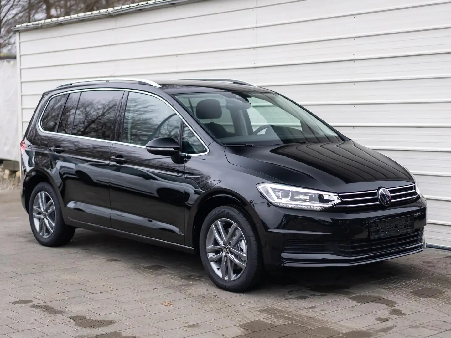 Volkswagen Touran 1.5 TSI 7DSG *7-Sitzer*AHK*Navi*Kamera*LED 110 ... Schwarz - 1
