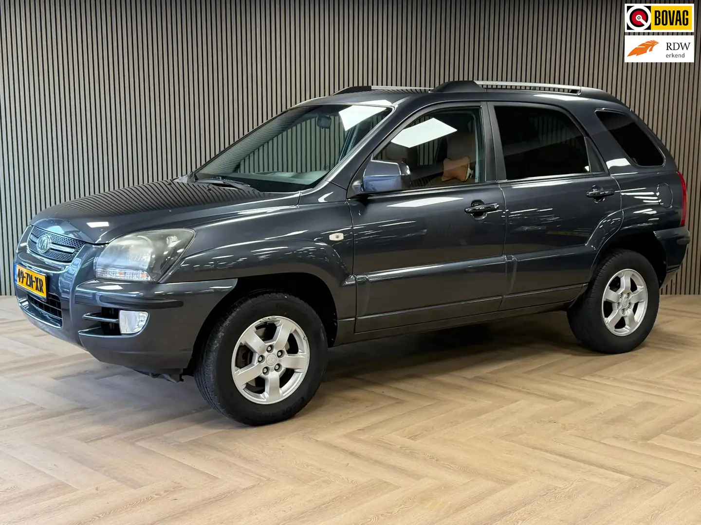 Kia Sportage 2.0 CVVT X-ception TREKHAAK NAVIGATIE BLUETOOTH ST Grau - 1