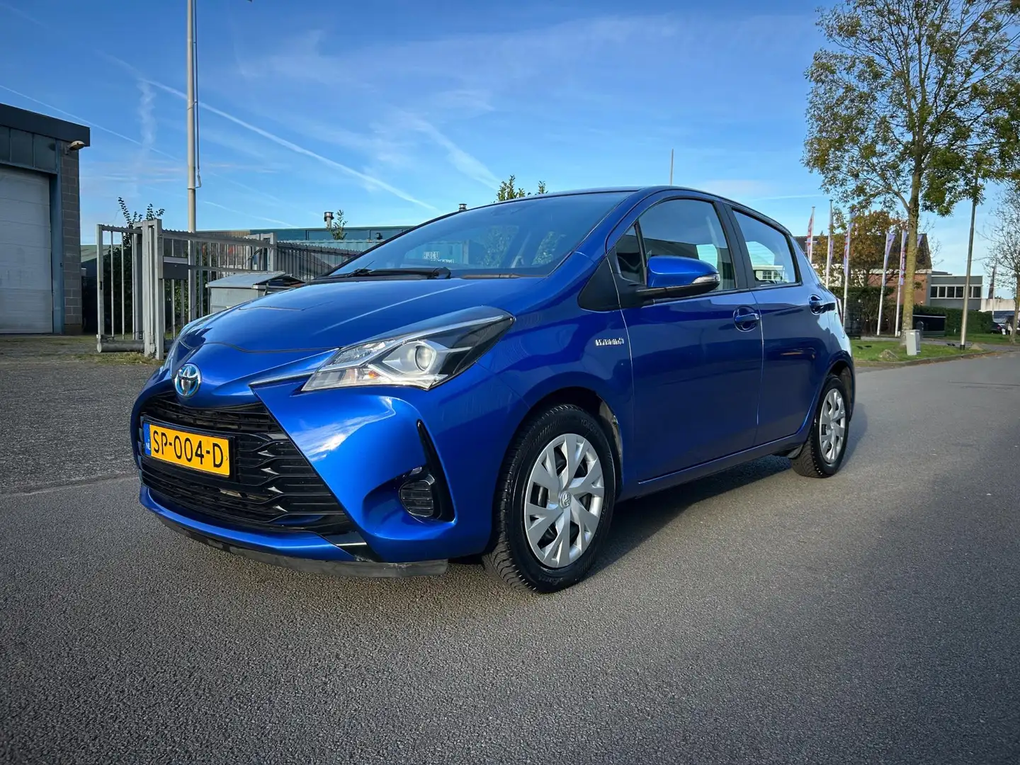 Toyota Yaris 1.5 Hybrid Aspiration Dealer Onderhouden Blauw - 1
