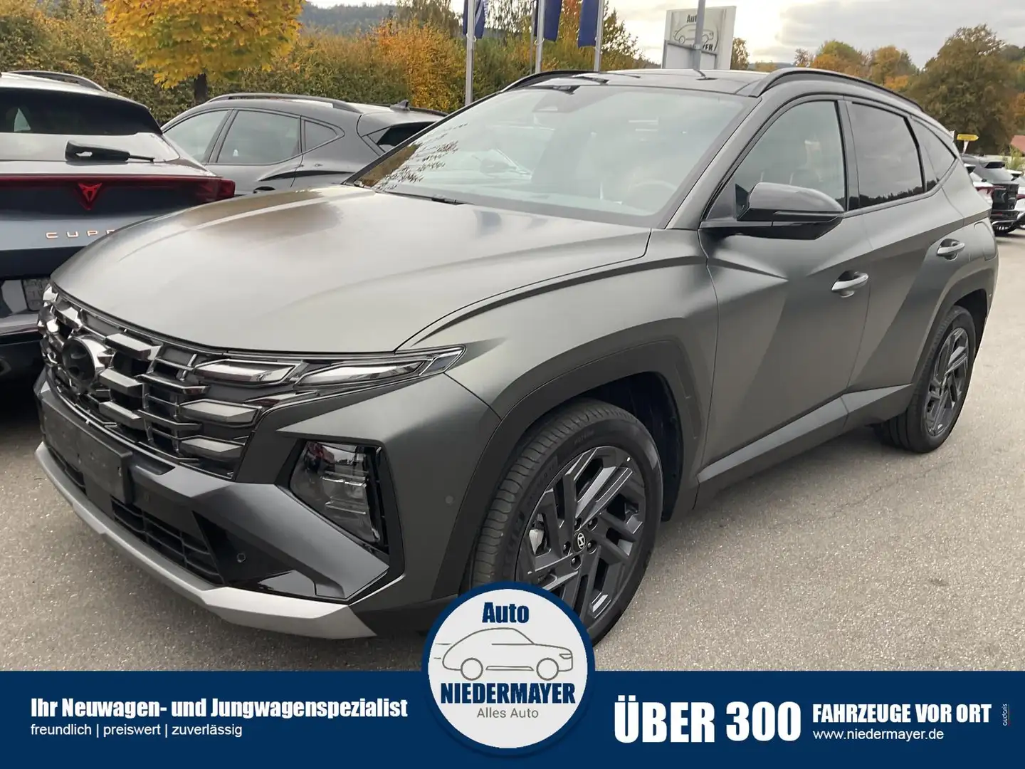 Hyundai TUCSON 1.6 T-GDI PHEV Luxury, AHK, Pano, Matrix, HuD, Sid Grün - 1