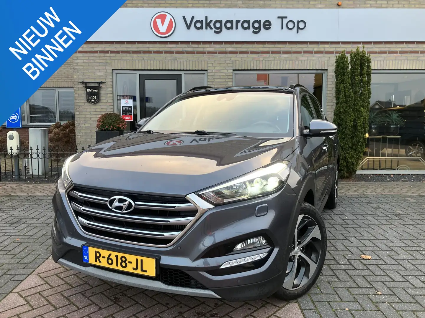 Hyundai TUCSON 1.6 T-GDi 4WD | Bomvol opties | Pano | Trekhaak Grau - 1