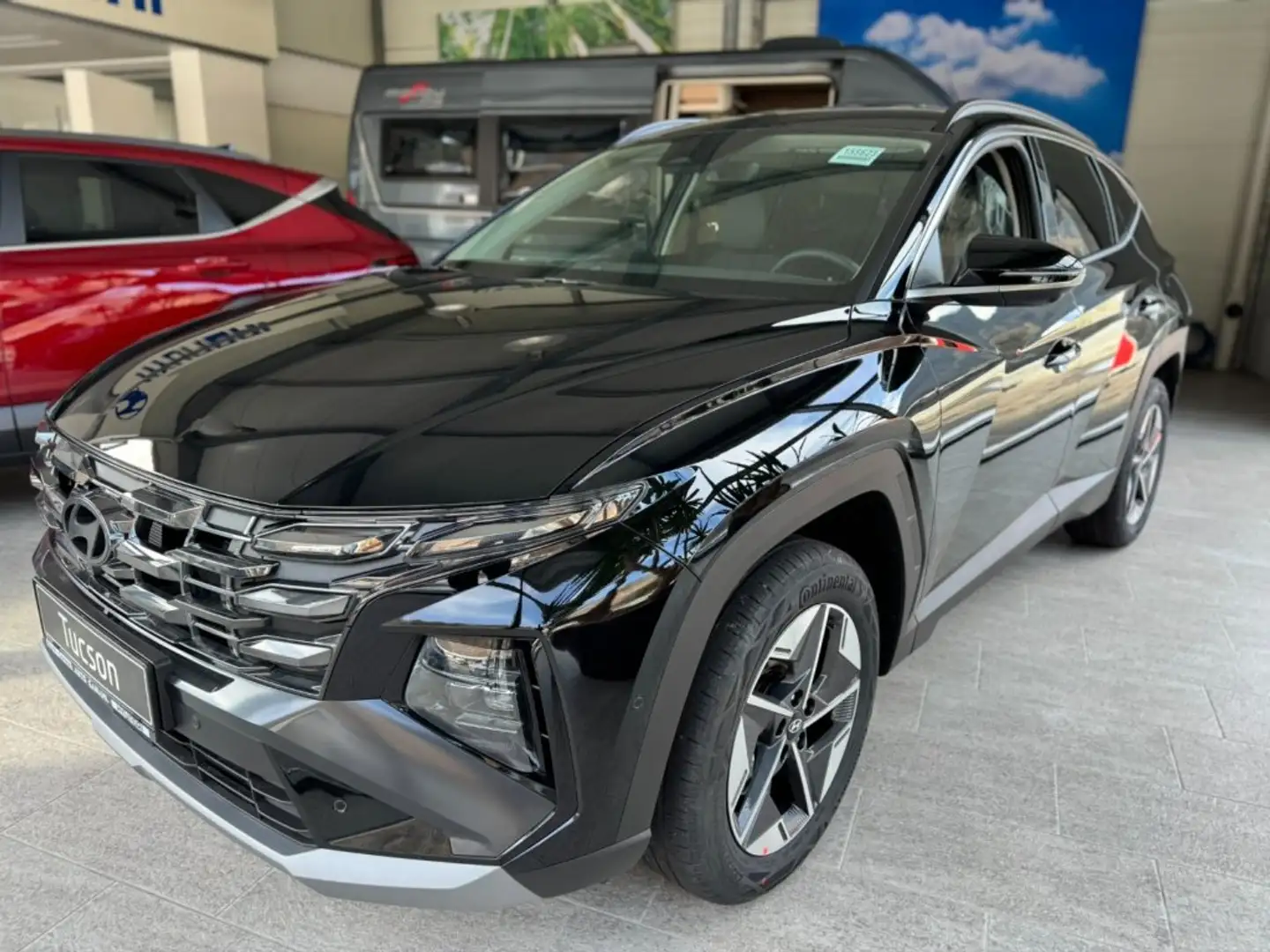 Hyundai TUCSON NX4 GO Plus 1,6 T-GDi PHEV 4WD AT t5pu1-PP1 Schwarz - 1