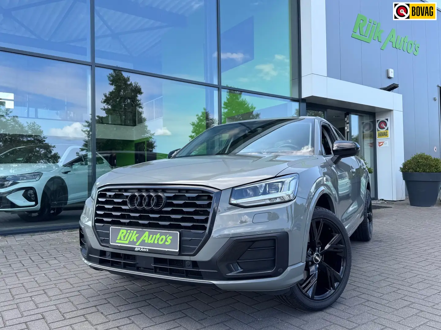 Audi Q2 30 TFSI Sport * Virtual Cockpit * Stoelverwarming Gris - 1