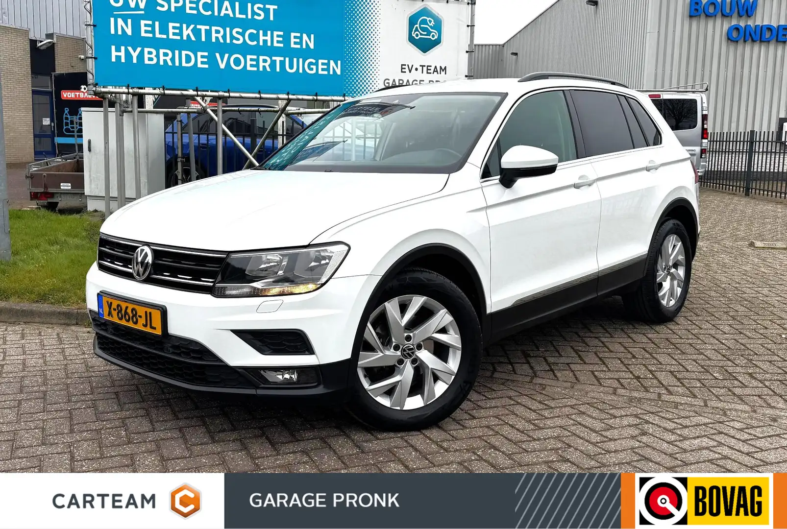 Volkswagen Tiguan 1.4 TSI ACT CARPLAY/NAVI/STOELVER/TREKHAAK Wit - 1