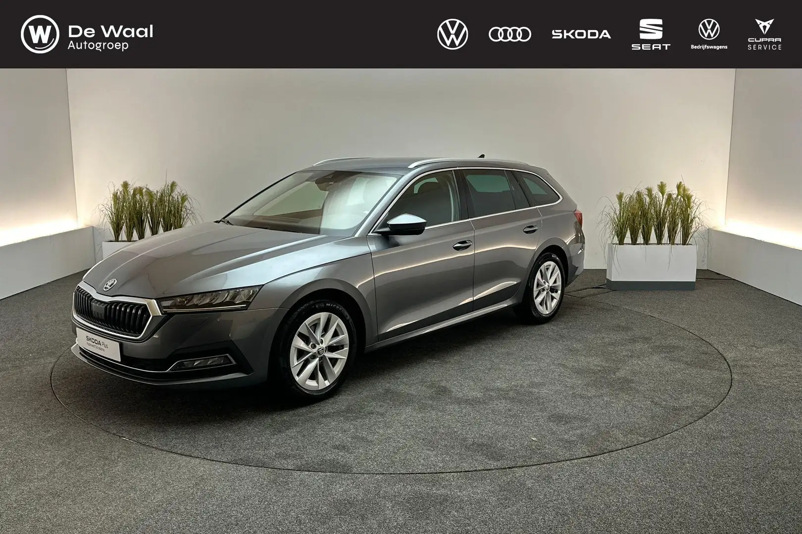 Skoda Octavia Combi 1.0 e-TSI 110pk DSG Business Edition Plus | Grijs - 1