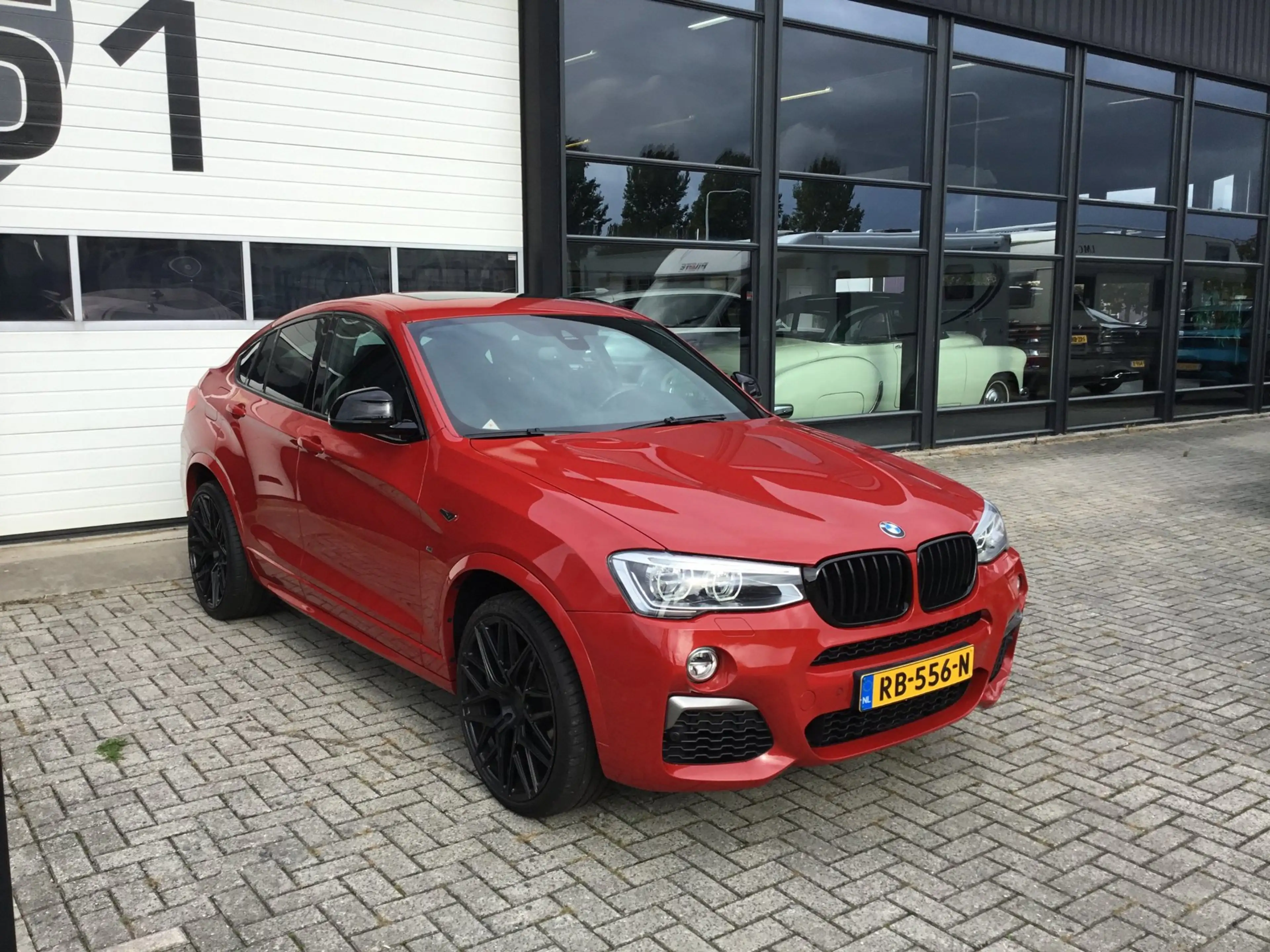BMW X4 M40i High Executive — photo 2