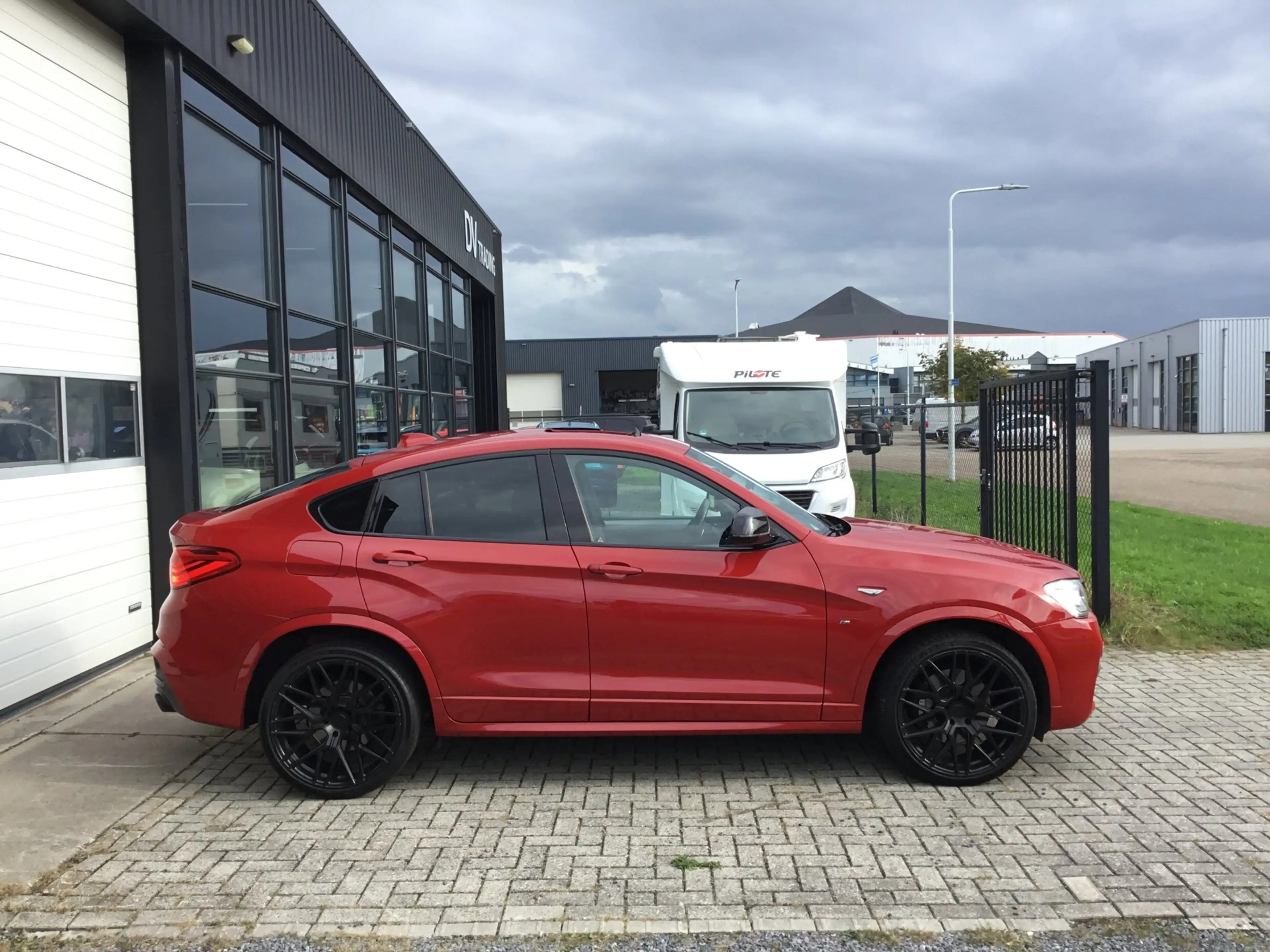 BMW X4 M40i High Executive — photo 6