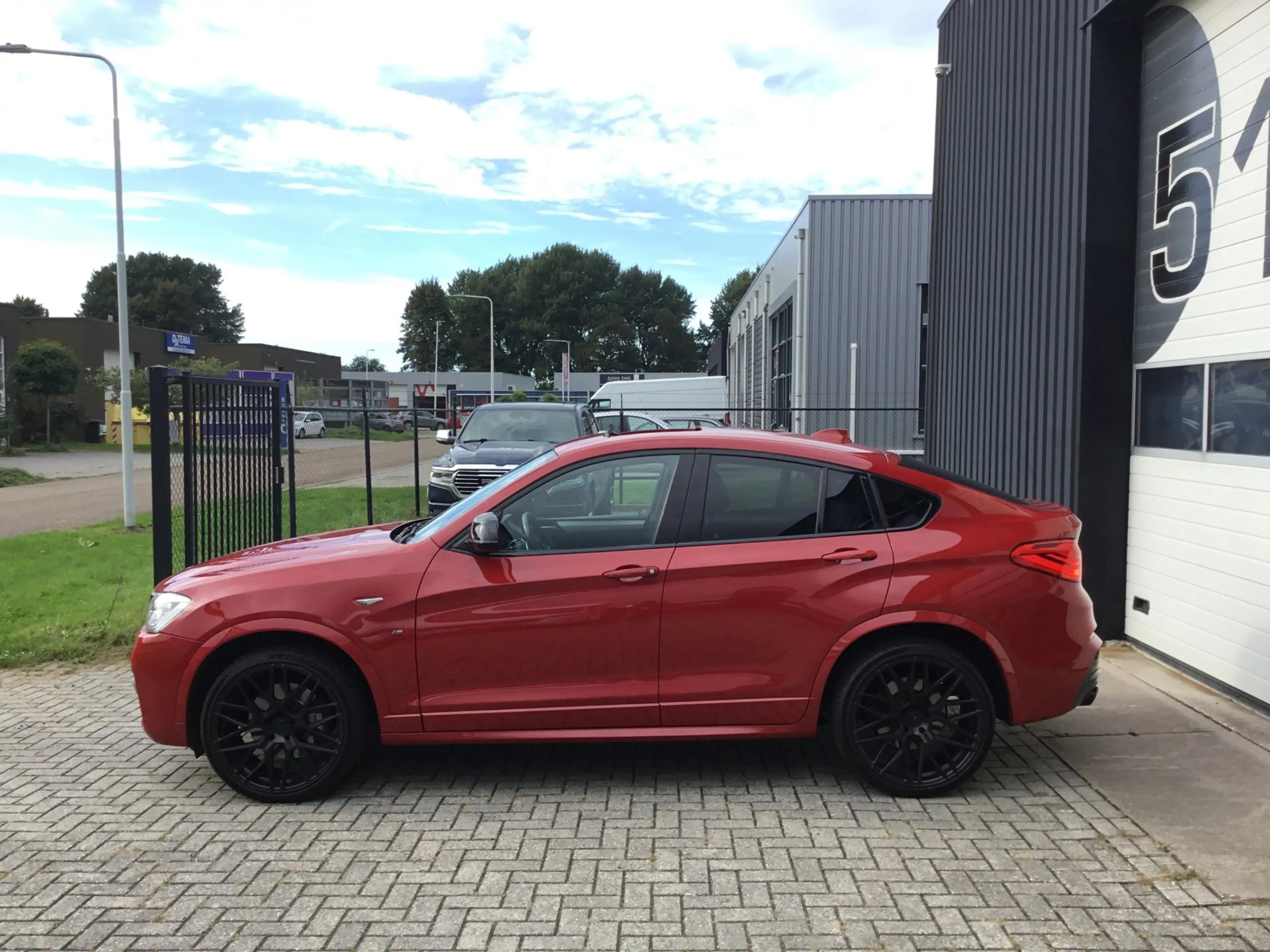 BMW X4 M40i High Executive — photo 12