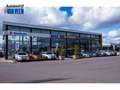 Suzuki Swift 1.0 Stijl Smart Hybrid + Trekhaak Rood - thumbnail 1
