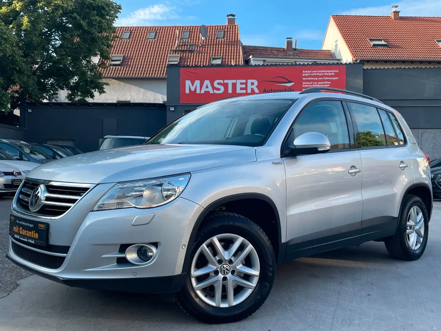 Volkswagen Tiguan Freestyle BMT *2.HAND*AHK*NAVI*PDC*SHZ* Zilver - 1