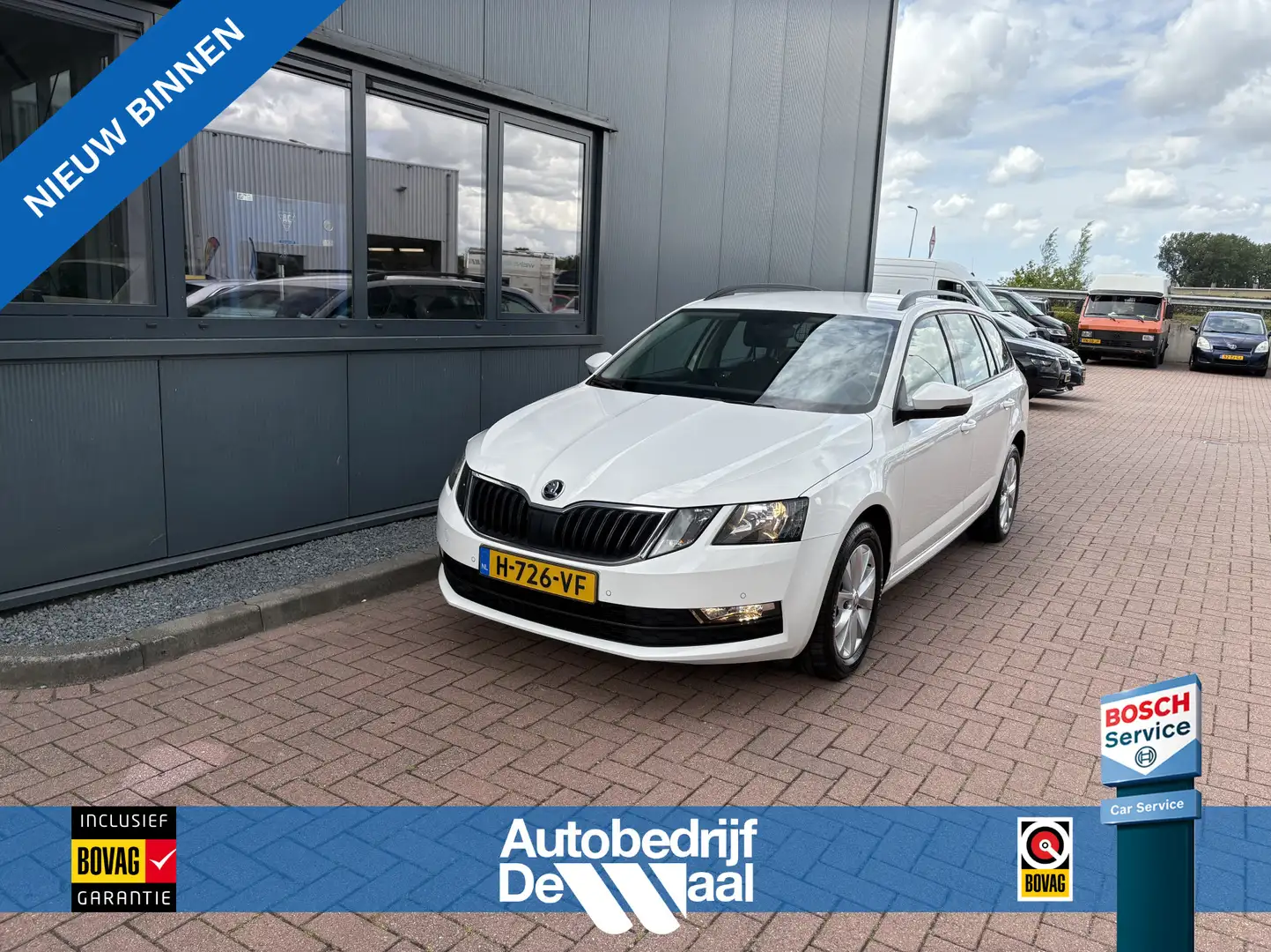 Skoda Octavia Combi 1.5 TSi 150pk DSG Business Edition CAMERA/VI Wit - 1