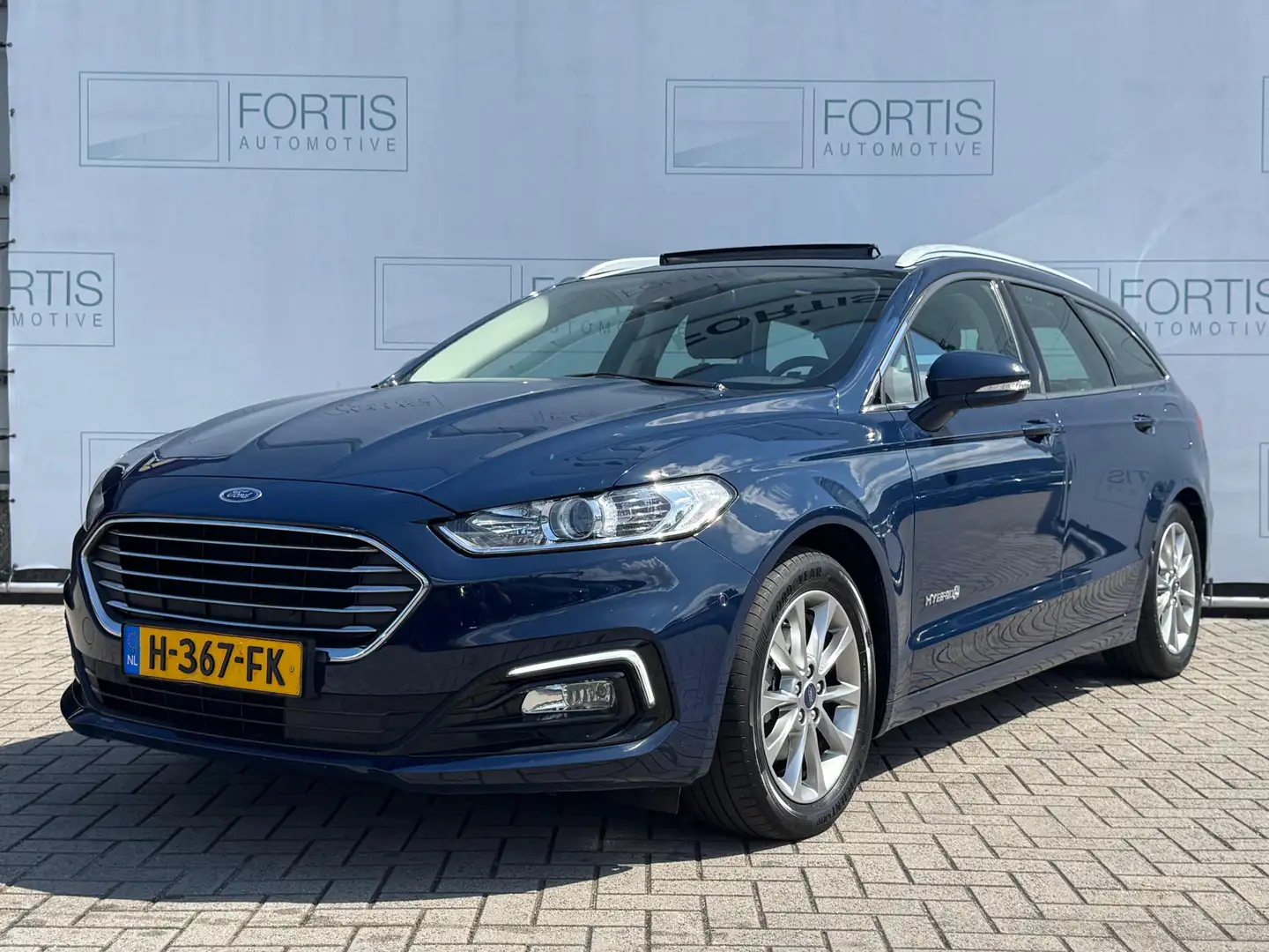 Ford Mondeo Wagon 2.0 IVCT HEV Titanium PANODAK | HYBRIDE | AU Blauw - 1