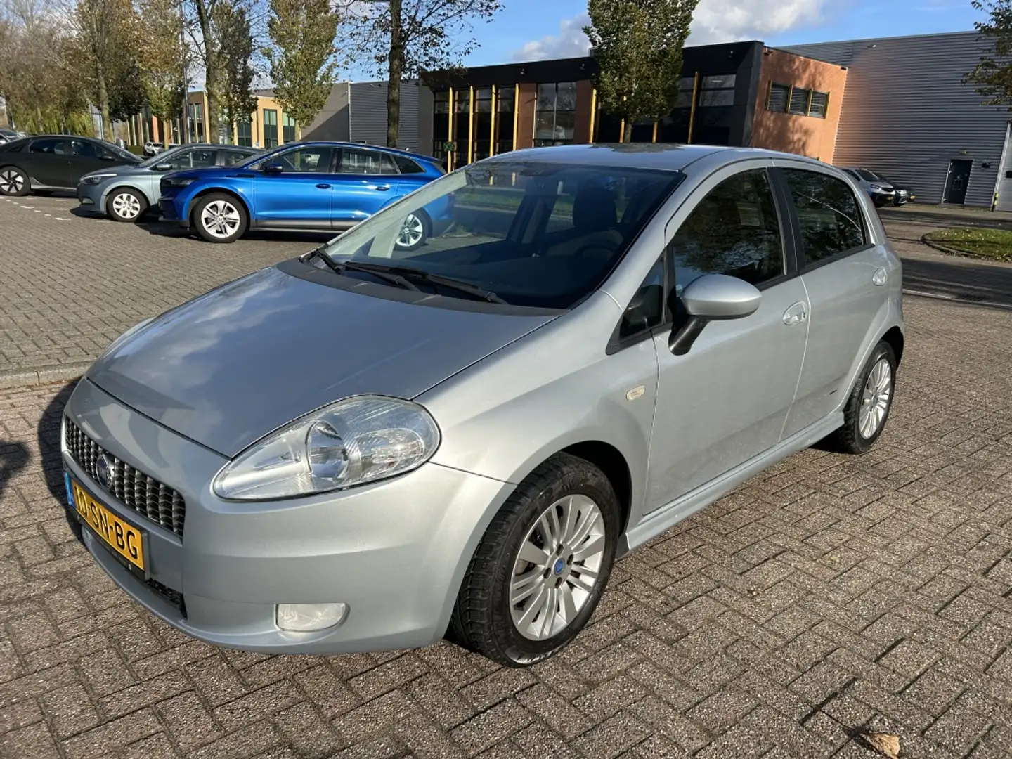 Fiat Grande Punto 1.4 Edizione Prima 78PK 1e EIGENAAR AIRCO NAP! Grijs - 1