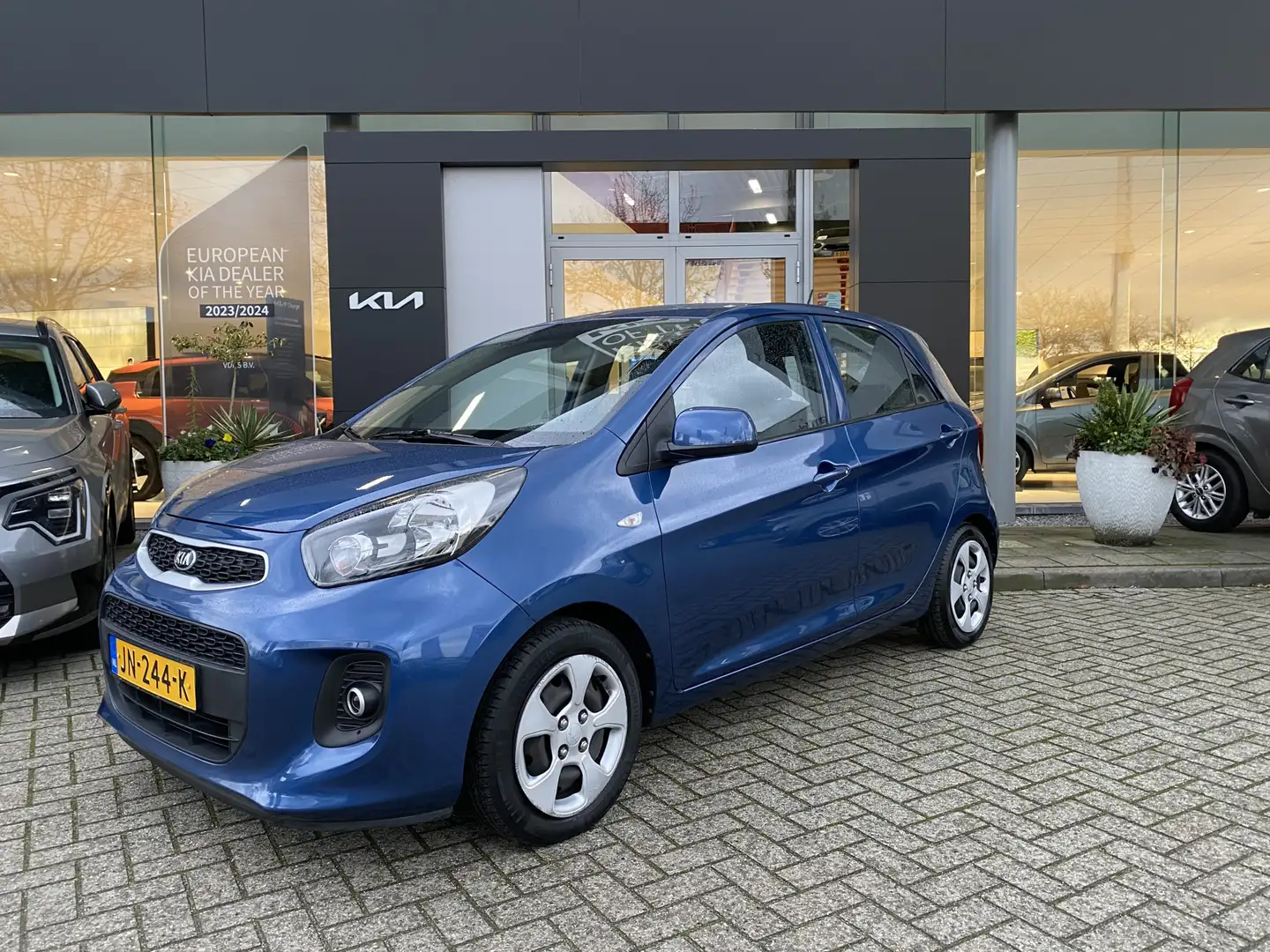 Kia Picanto 1.0 CVVT EconomyPlusLine Airco | Info Daan 0492-58 Blau - 1