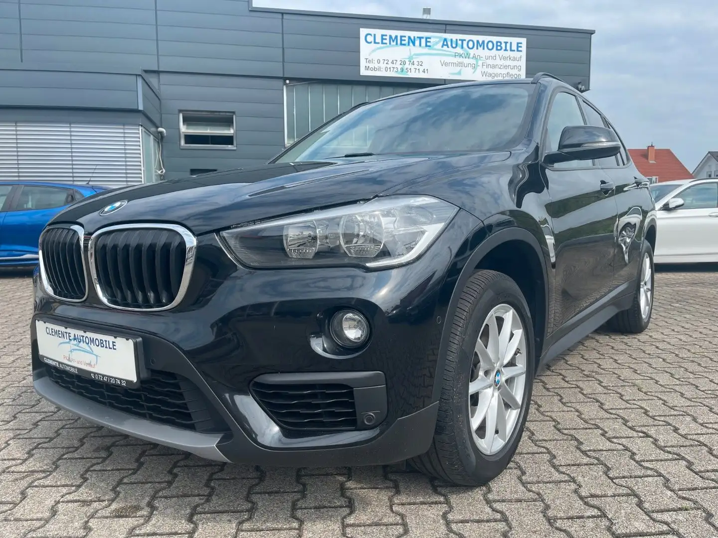 BMW X1 sDrive 20 i Advantage*Navi*SHZ*Kamera* Noir - 1