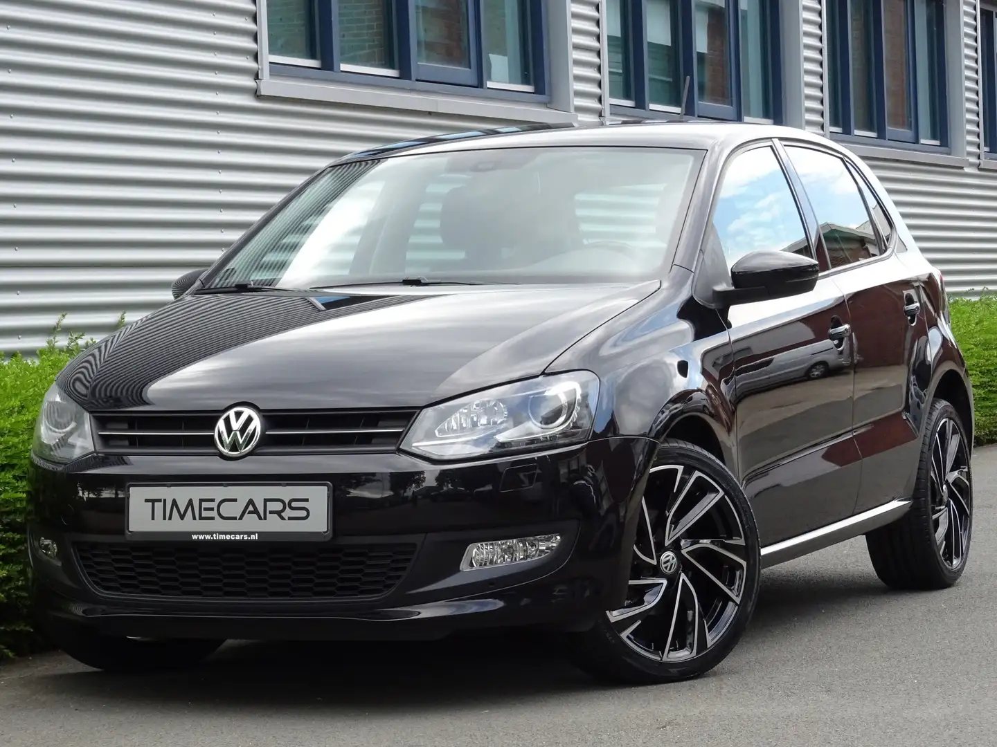 Volkswagen Polo 1.4 5-Drs Team Xenon Sportstoelen Navigatie PDC Zwart - 1