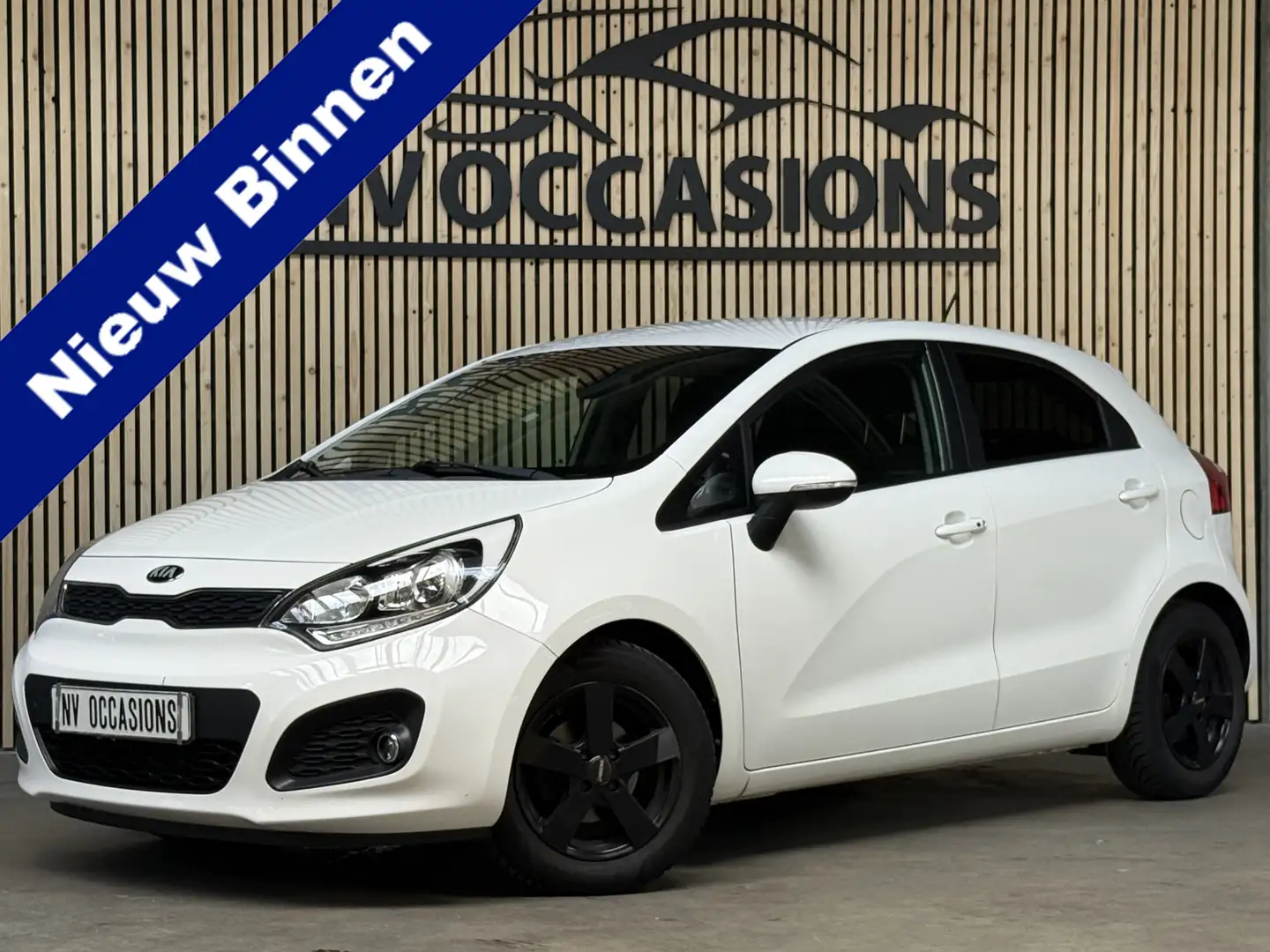 Kia Rio 1.2 CVVT Super Pack PDC/ECC/NAVI/SPORTIEF/15"/KEYL Wit - 1