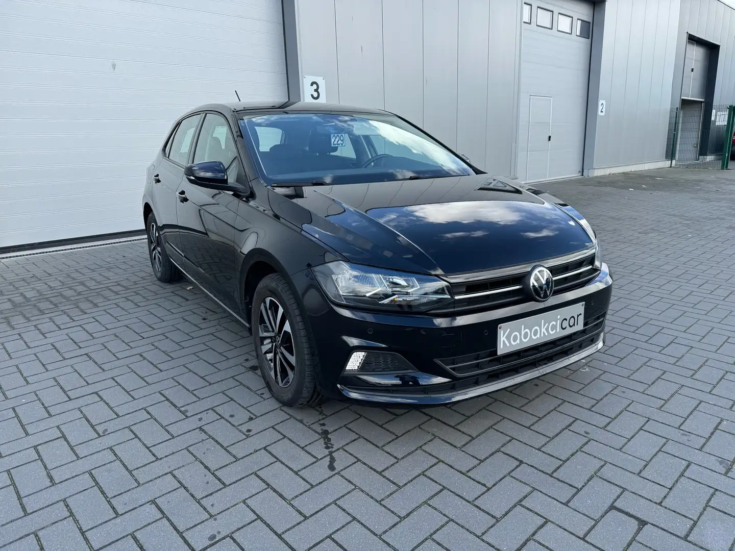 Volkswagen Polo 1.0i United (EU6AP) // GARANTIE 12 MOIS // Noir - 1