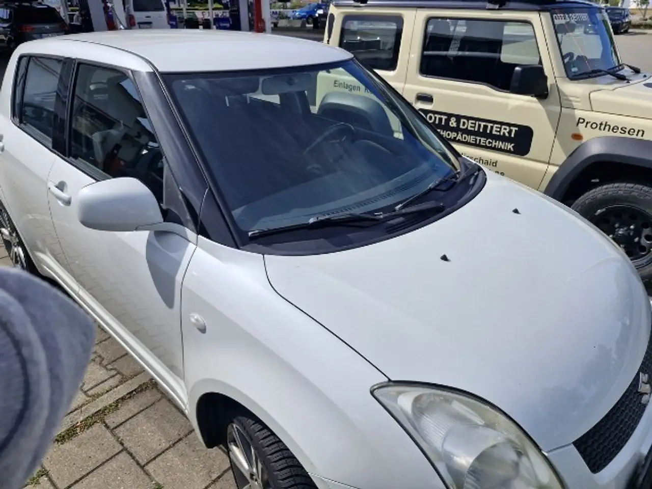 Suzuki Swift 1,3 Black and white — photo 2