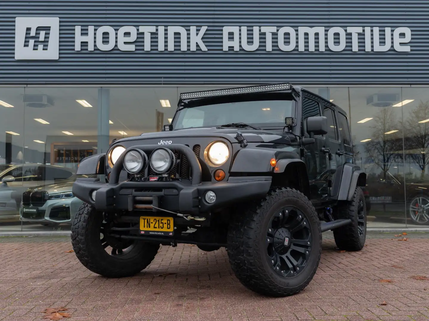 Jeep Wrangler Unlimited 3.6 Sahara | Cruise | Side step | Lier Zwart - 1