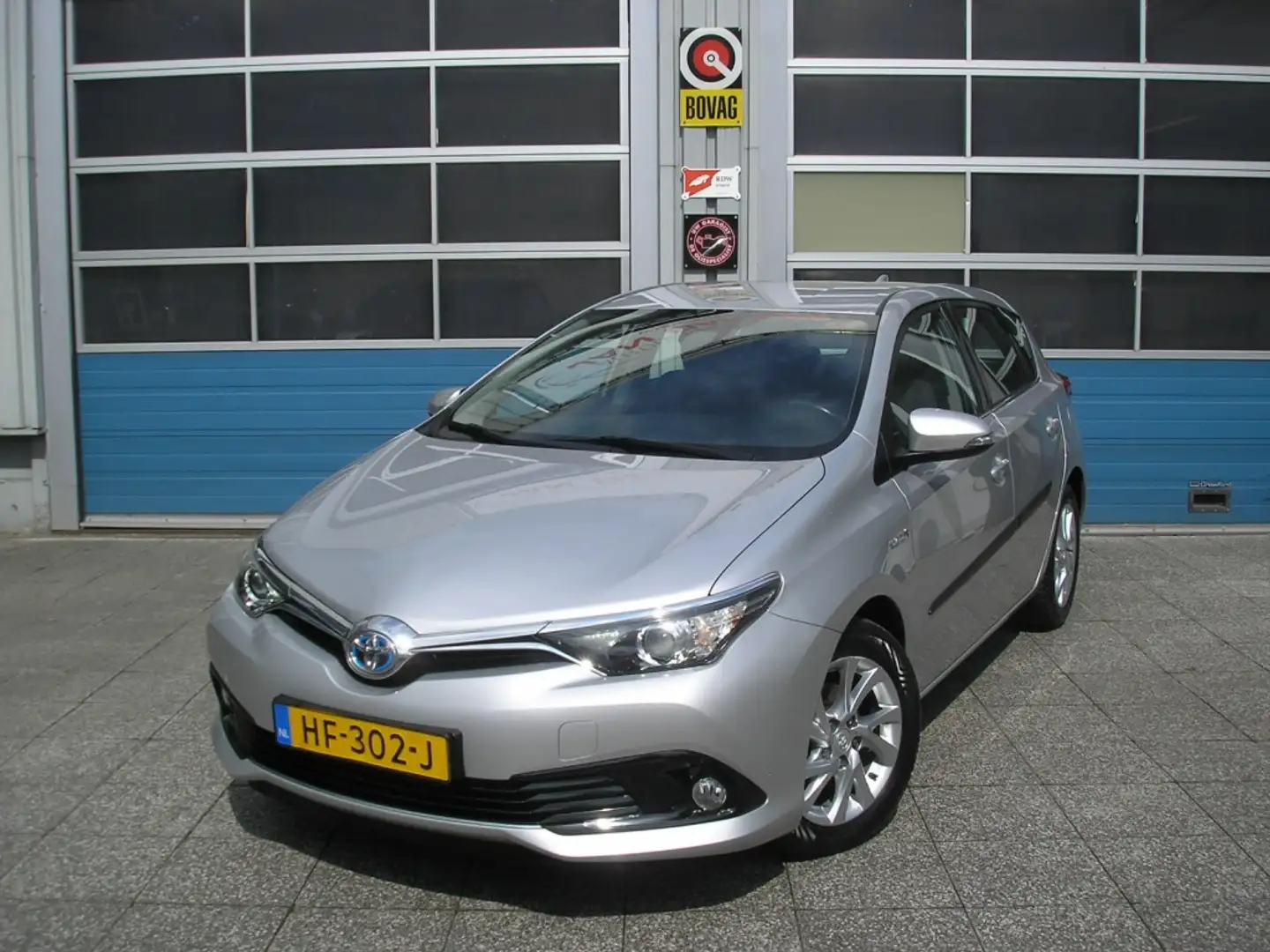 Toyota Auris 1.8 Hybrid Aspiration 1e eigenaar facelift Gris - 2