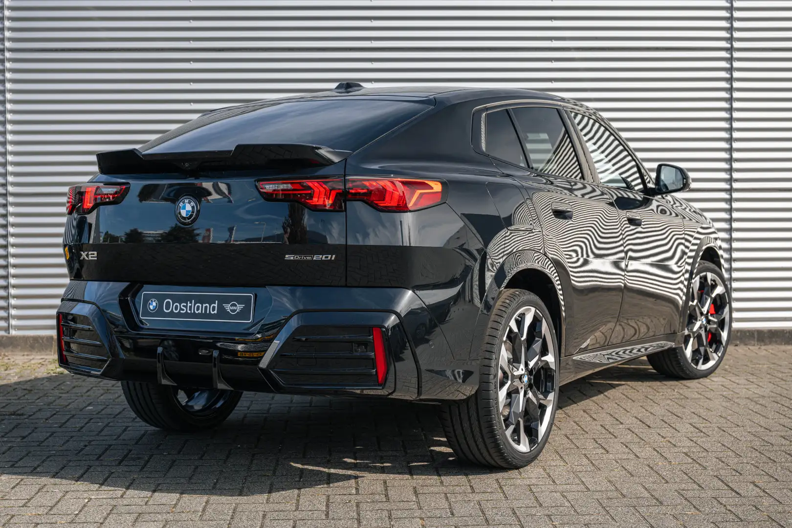 BMW X2 sDrive20i High Executive M Sport Automaat / Panora Zwart - 2