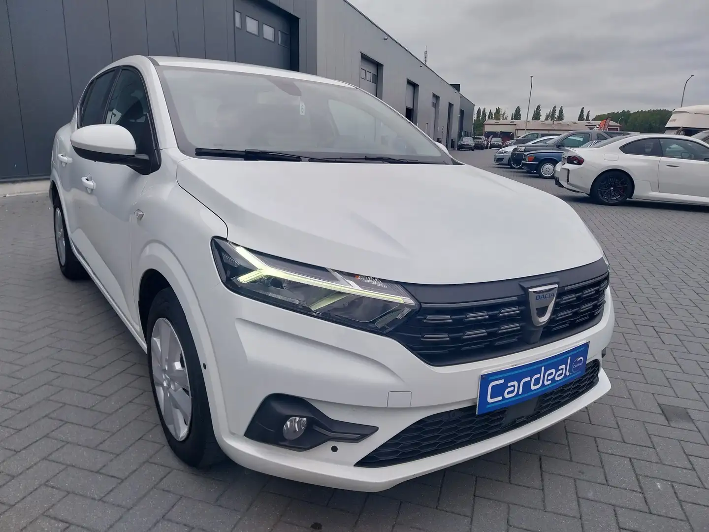 Dacia Sandero Sandero 1.0i SCe Comfort/GPS/CAMERA/AIRCO/GARANTIE Blanc - 1