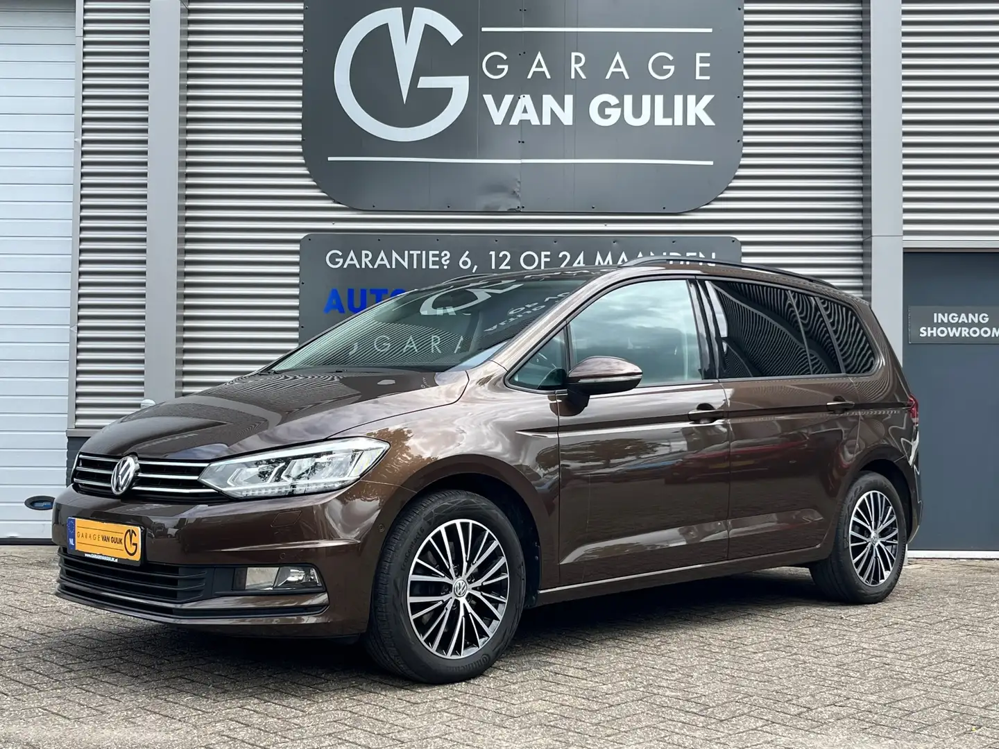 Volkswagen Touran 1.4 TSI 150PK 7Persoons,Automaat,Trekhaak,Navi,Cli Bruin - 1