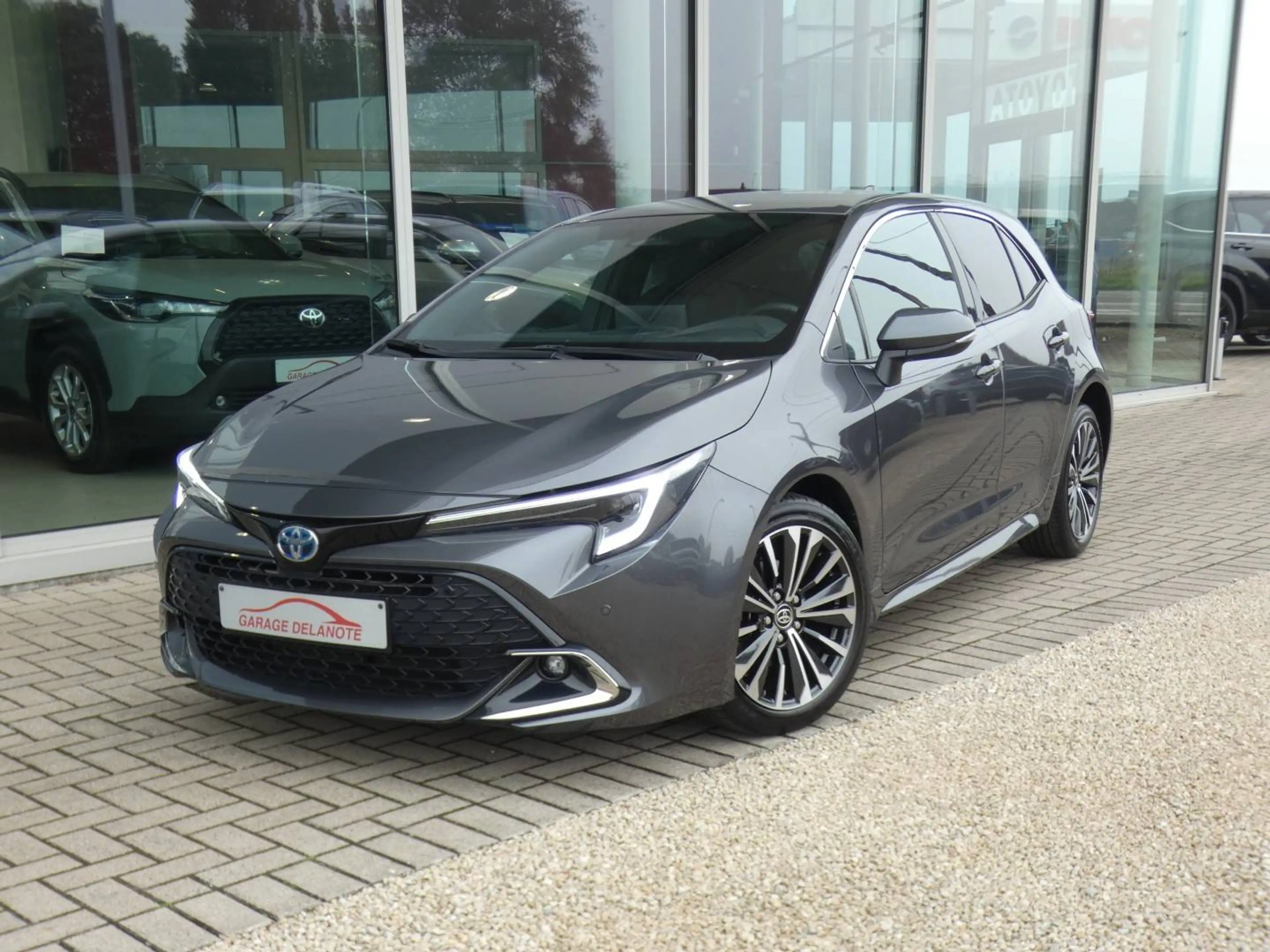 Toyota Corolla HB 1.8 Hybrid STYLE+TECH PACK 140pk +Dodehoek +Stuurwielverwarming +Zetelverwarming +Half leder +GPS — photo 2