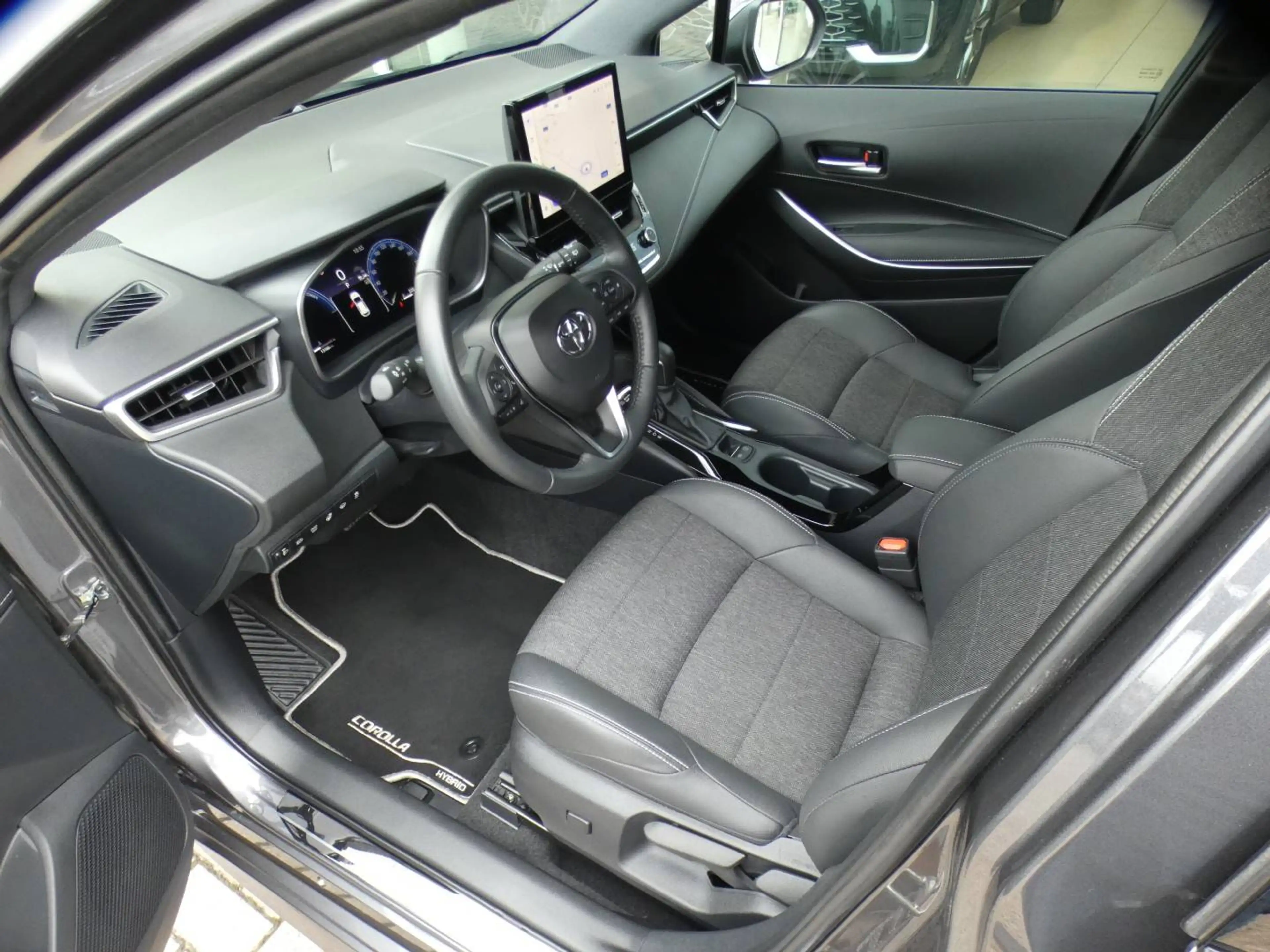 Toyota Corolla HB 1.8 Hybrid STYLE+TECH PACK 140pk +Dodehoek +Stuurwielverwarming +Zetelverwarming +Half leder +GPS — photo 9