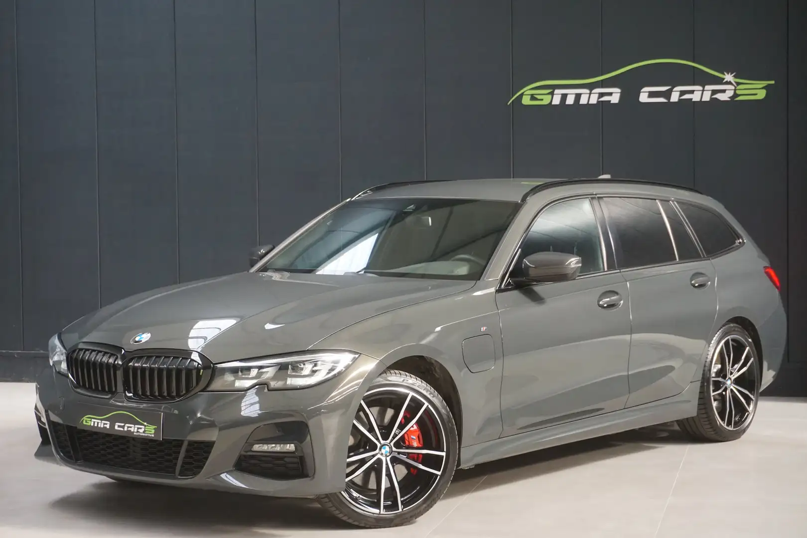 BMW 320 eA Touring PHEV M Pack Nav-H.Leder-Led-Garantie Grijs - 1