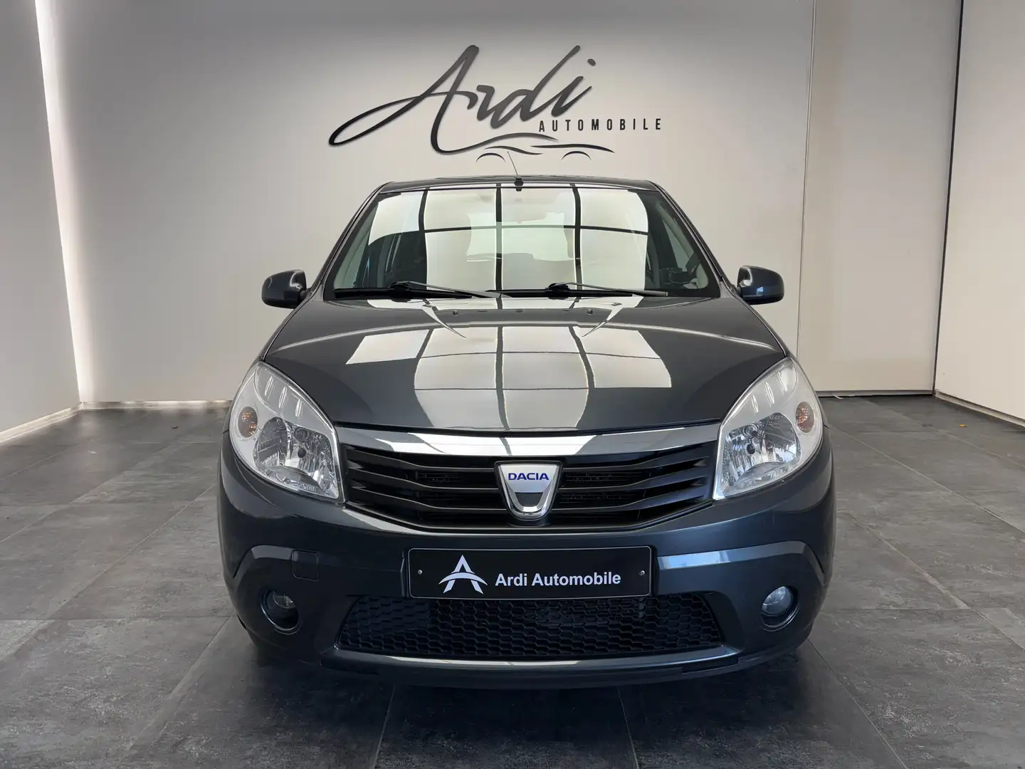 Dacia Sandero 1.2i *AIRCO*GPS*1ER PROPRIETAIRE*GARANTIE 12 MOIS* Gris - 2