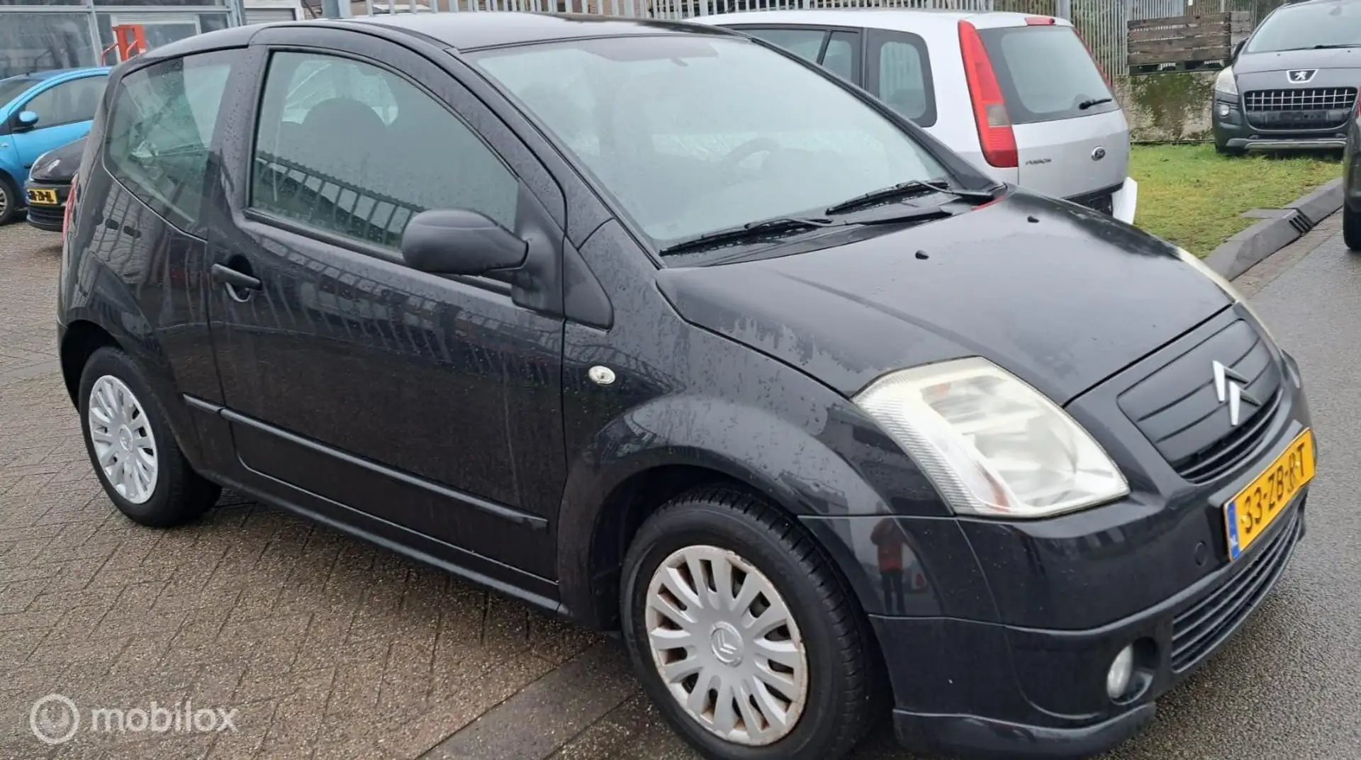 Citroen C2 1.1i Caractère bj. 2007 Schwarz - 2