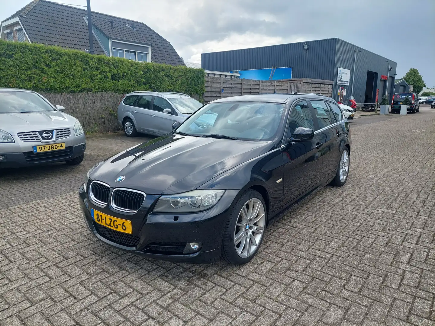 BMW 318 3-serie Touring 318i Business Line Zwart - 1