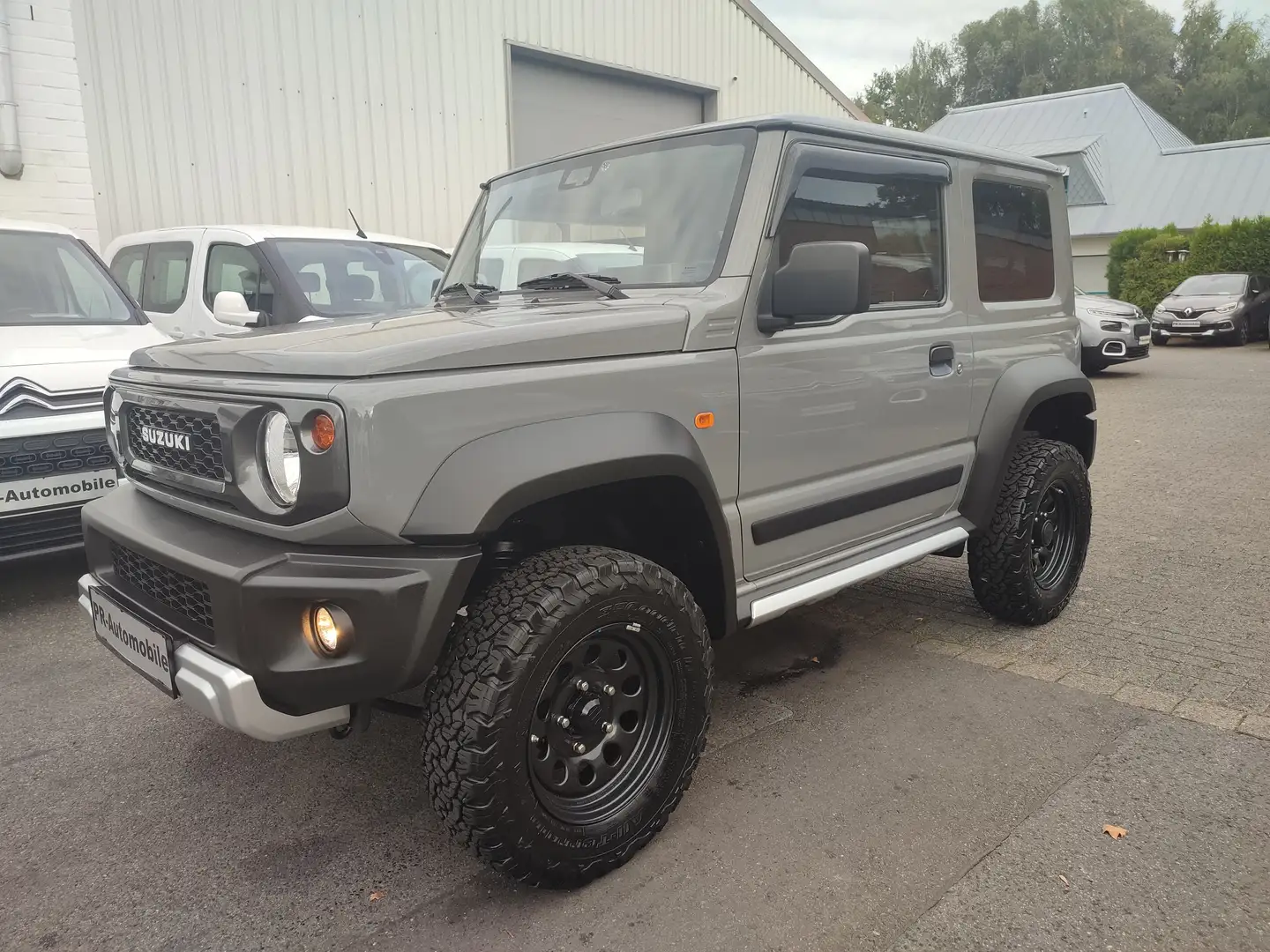 Suzuki Jimny 1.5 Automatik Klima/AHK/Cam/Sitzhzg./Standhzg. Grau - 1