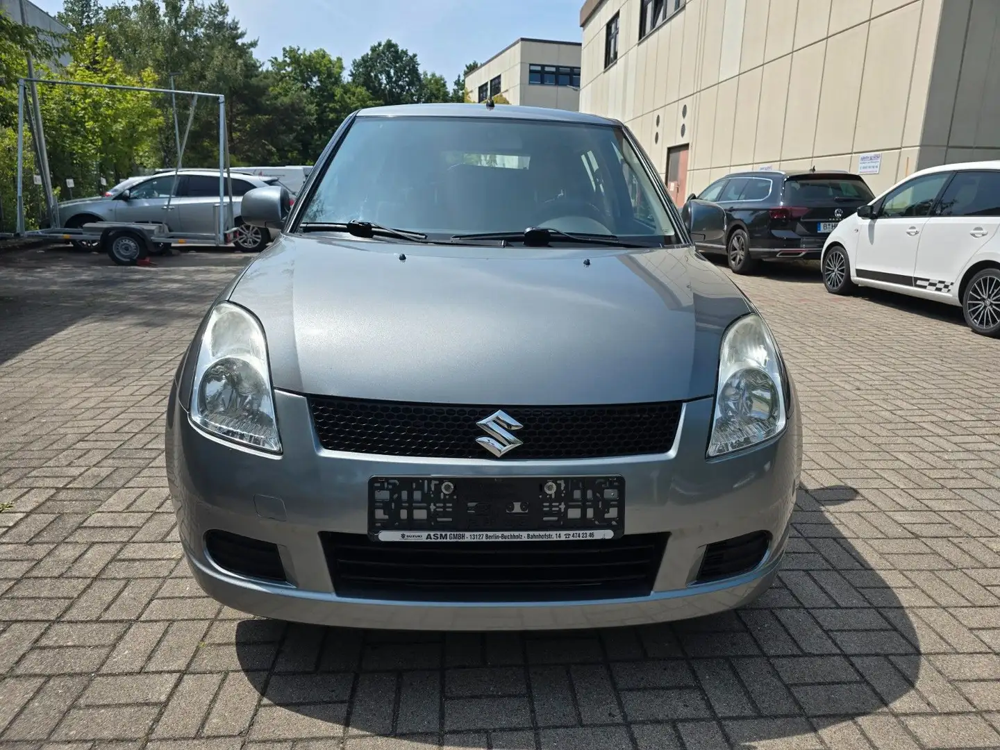 Suzuki Swift Lim. Dance Club Gris - 1