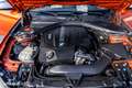 BMW 135 1-serie M135i xDrive High Executive Oranje - thumbnail 34