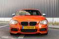 BMW 135 1-serie M135i xDrive High Executive Oranje - thumbnail 8