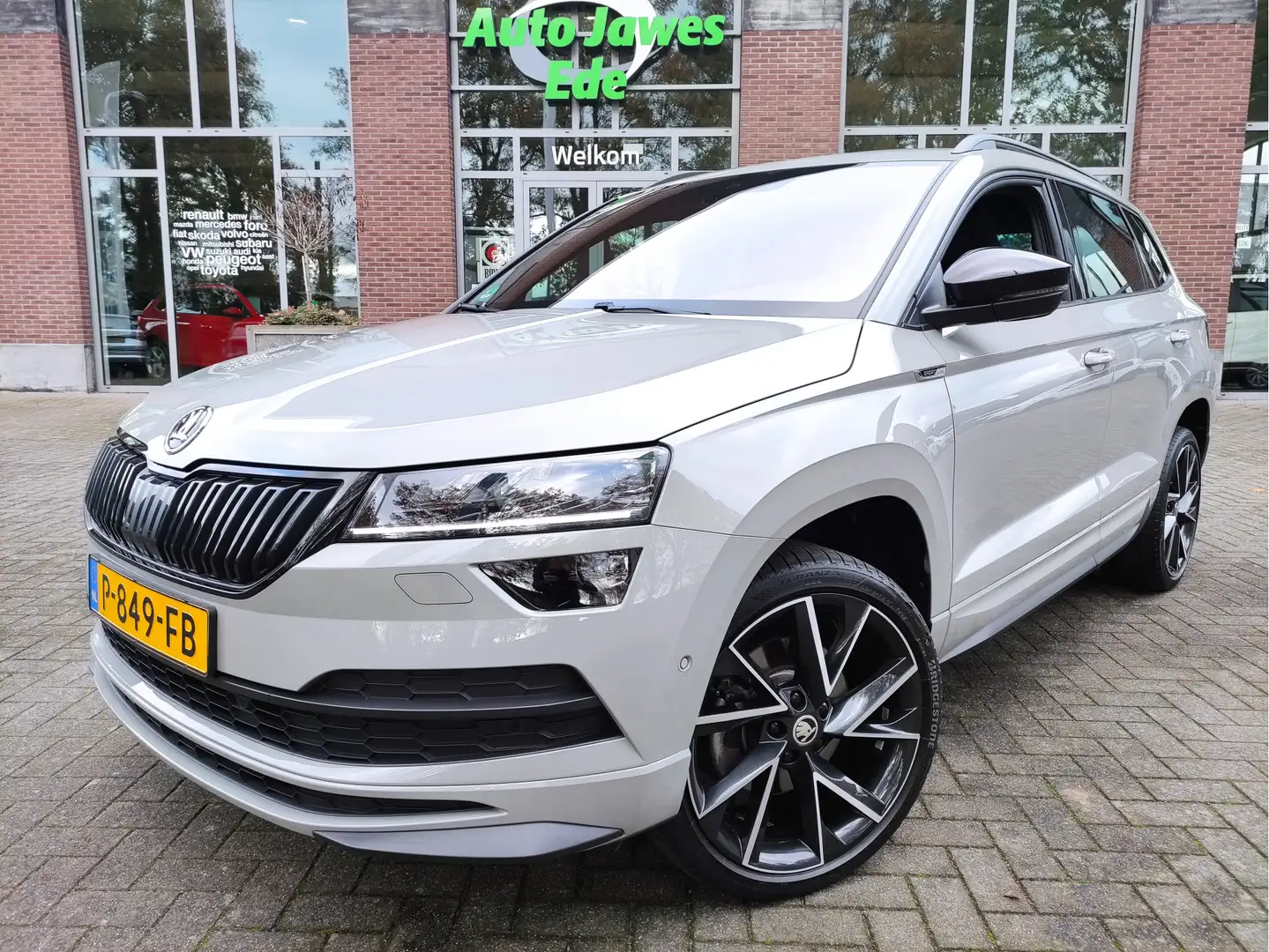 Skoda Karoq 1.5 TSI DSG ACT Sportline Business Wegklapbare tre Grijs - 1