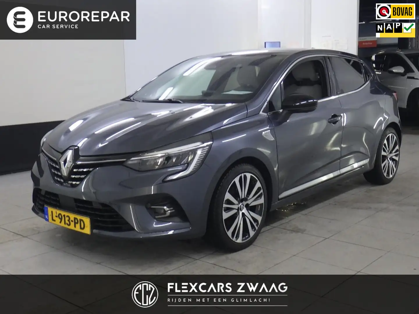 Renault Clio 1.6 E-Tech Hybrid 140 Initiale Paris - Navi groot Gris - 1