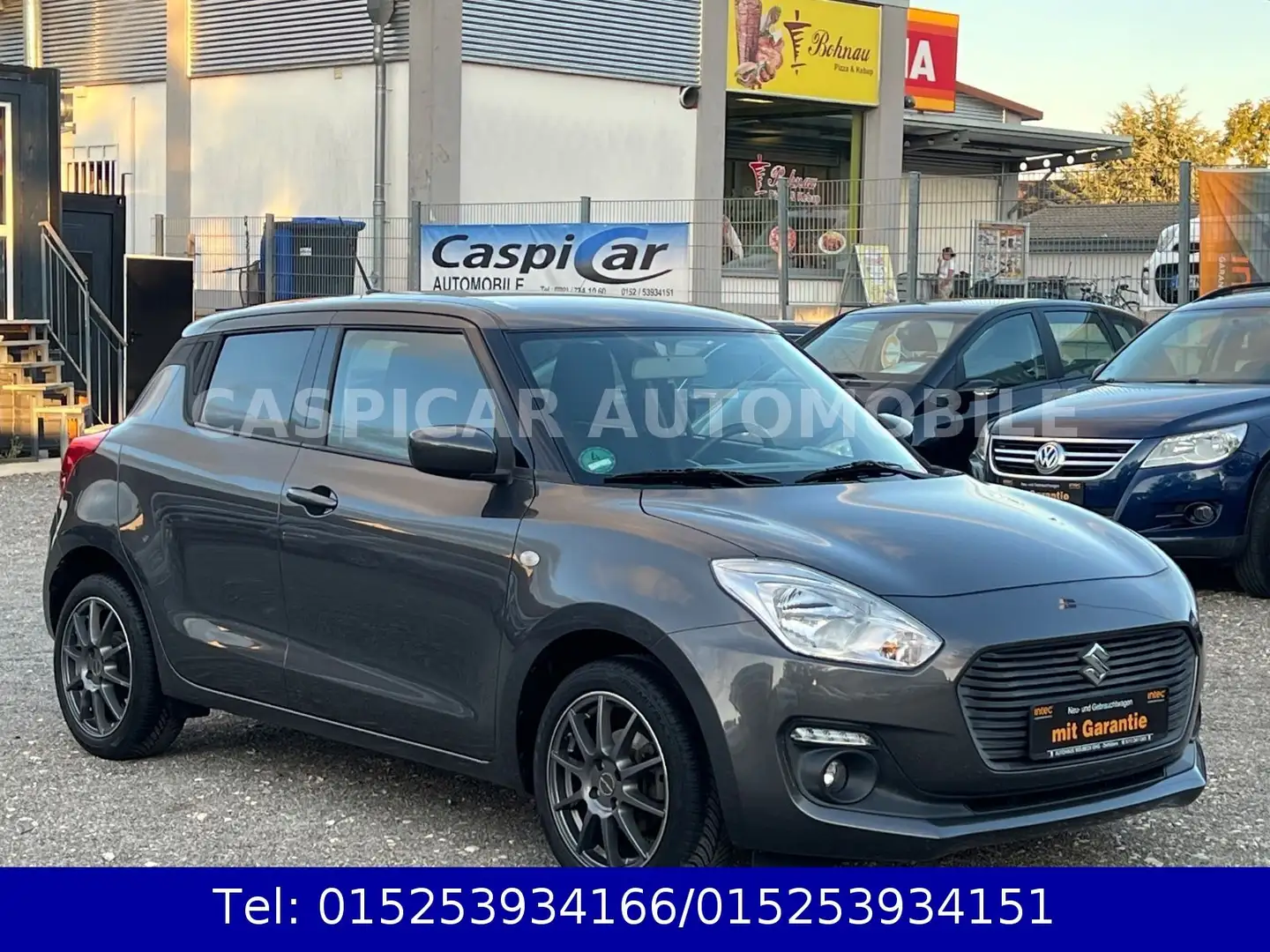Suzuki Swift 1,2 Dualjet Comfort,KLIMA,NAVI,TÜV-07.2027 Grau - 1