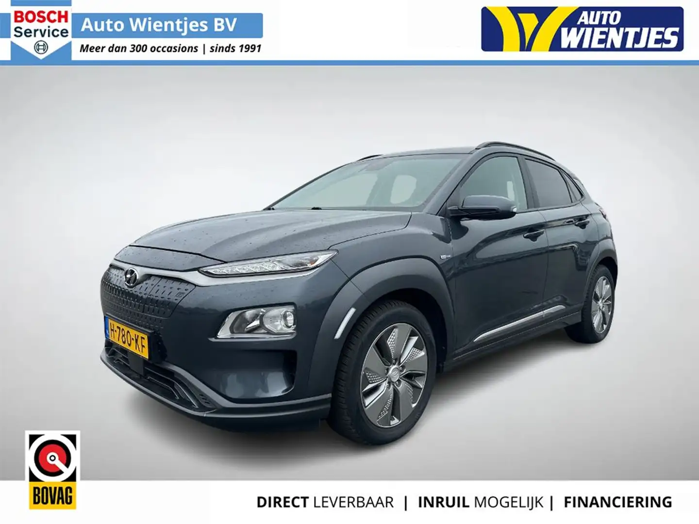 Hyundai KONA EV Fashion 64kWh | SOH 100% | Navi | Camera Grijs - 1