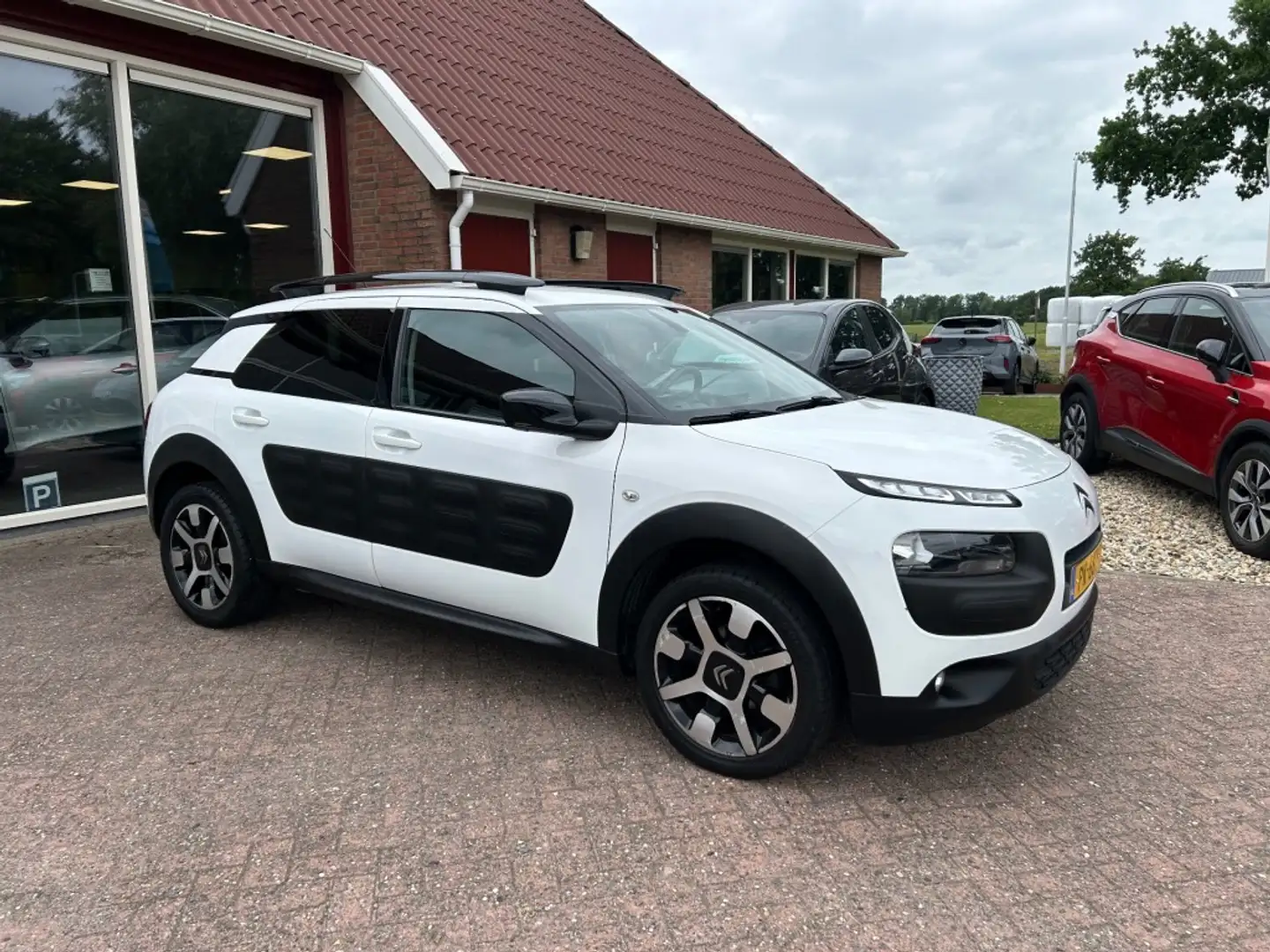 Citroen C4 1.2 PURETECH SHINE AIRCO/ECC/CRUISE/NAVI/PDC/TREKH Blanc - 1