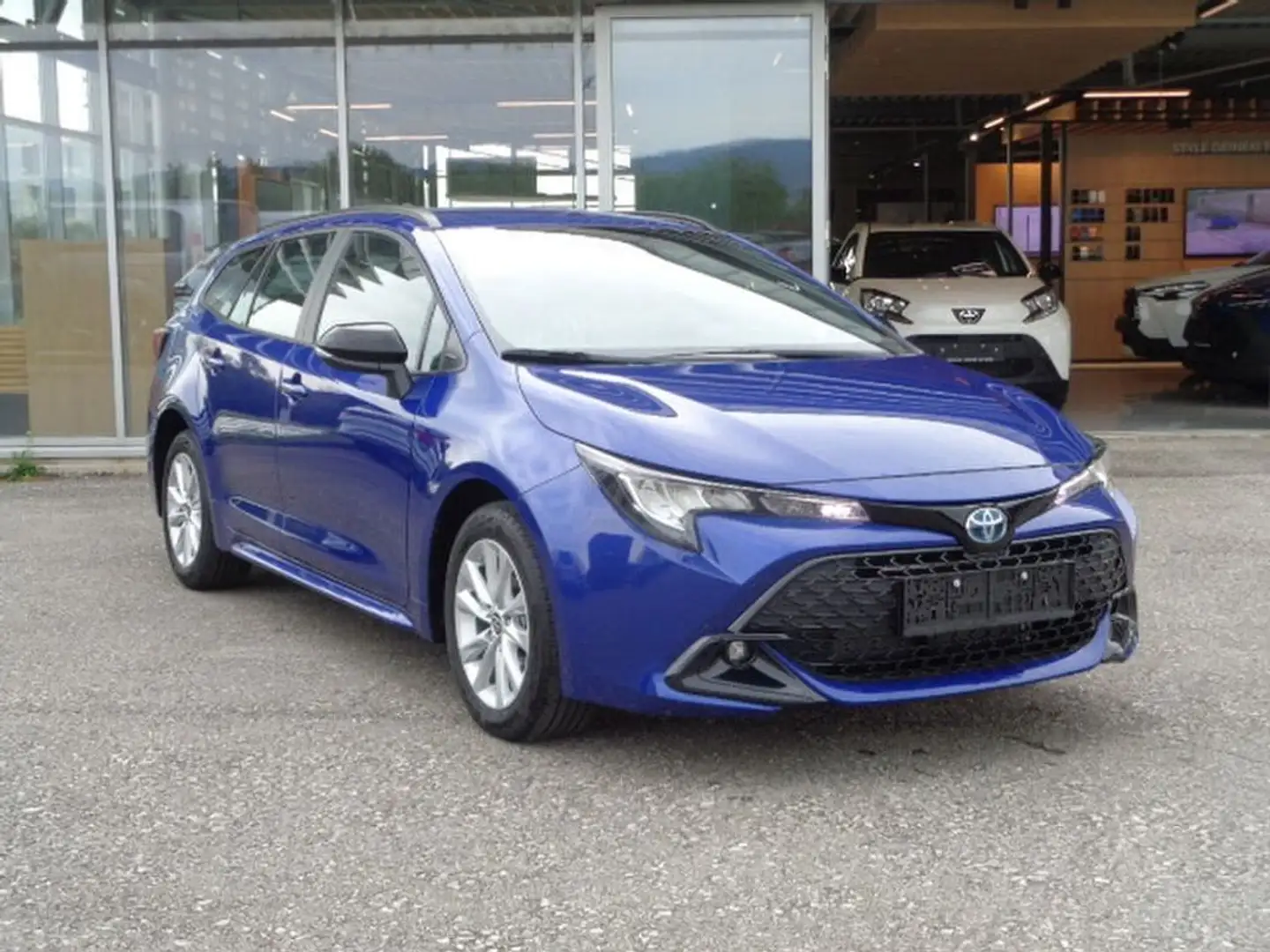 Toyota Corolla 1,8 Hybrid Touring Sports Active Blau - 1