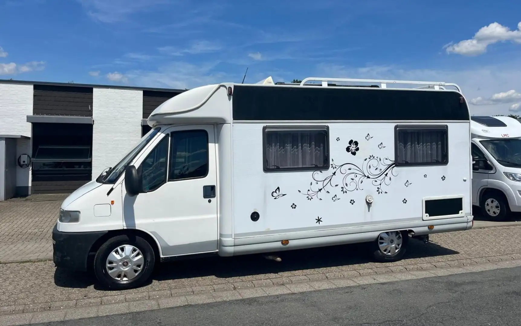 Bürstner T 595 - Festbett - auto.Sat/TV - Solar - Markise Blanc - 1