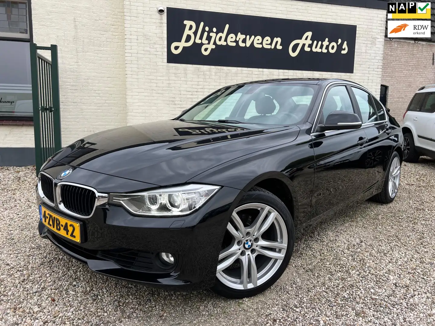 BMW 320 3-serie 320i High Executive Org. NL | Navi | Leer Nero - 1