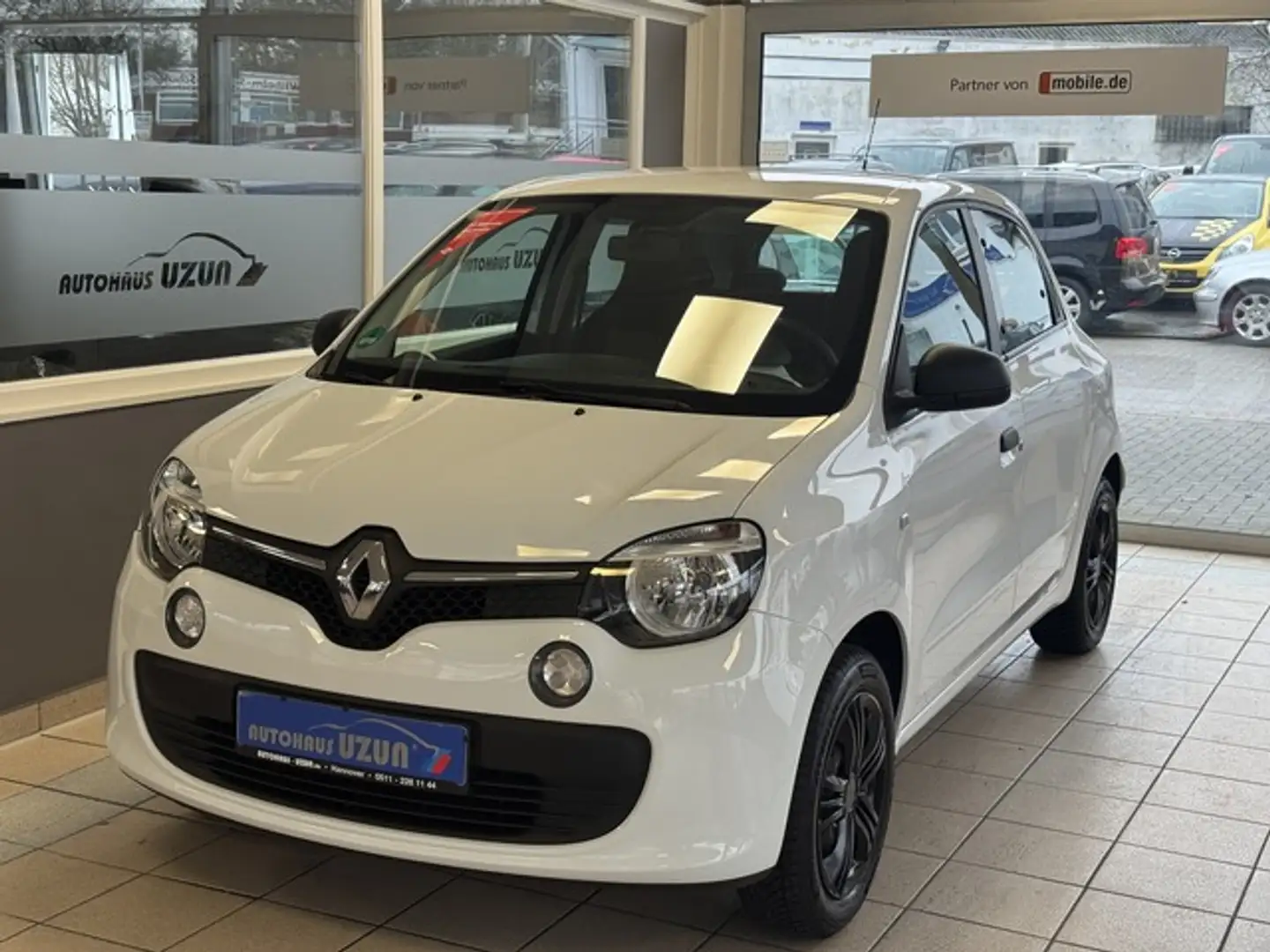 Renault Twingo Scheckheft Allwetterreifen Wit - 1
