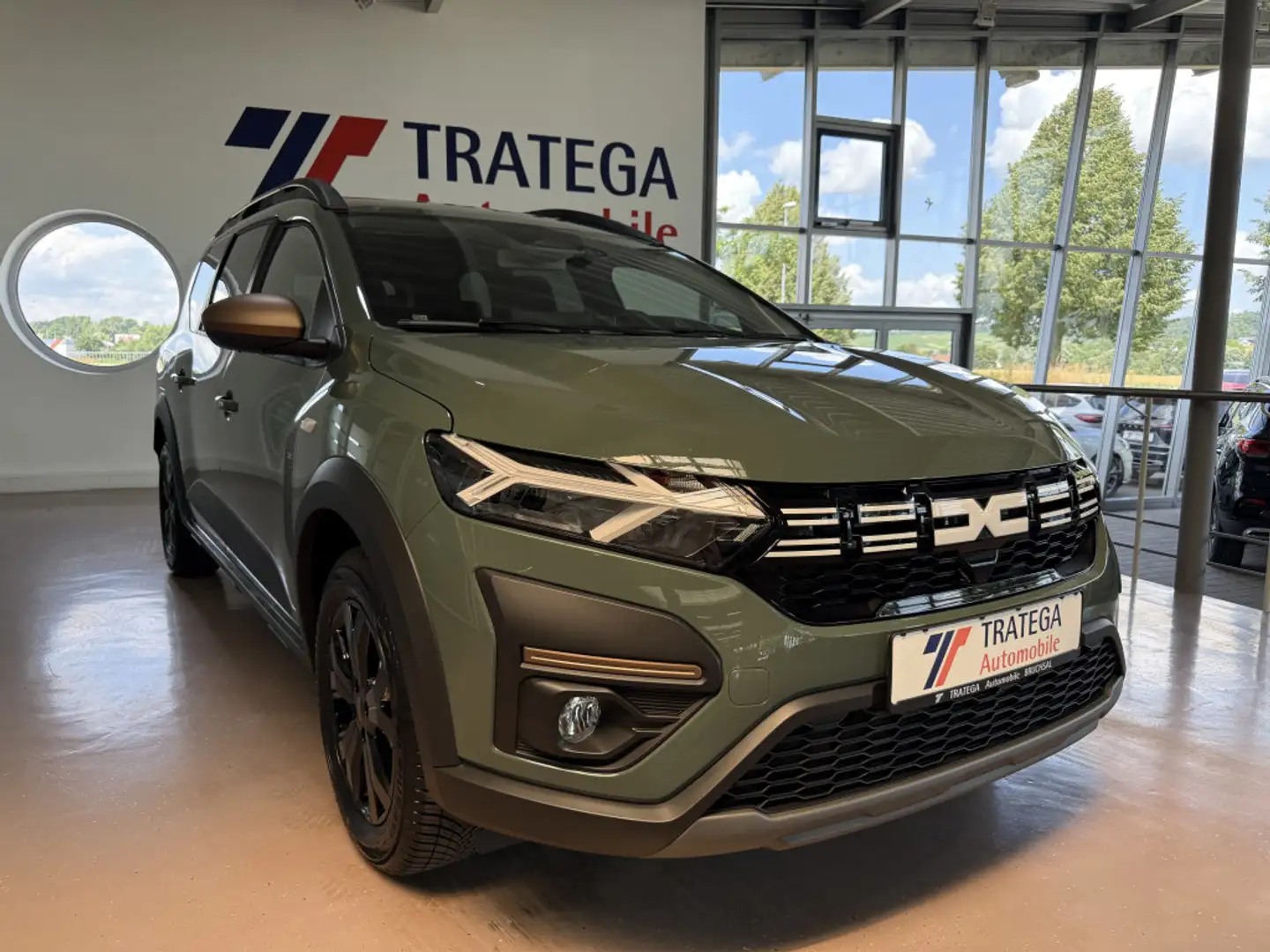 Dacia Jogger Hybrid 140 Autom Extreme SH Navi GJR Grün - 1