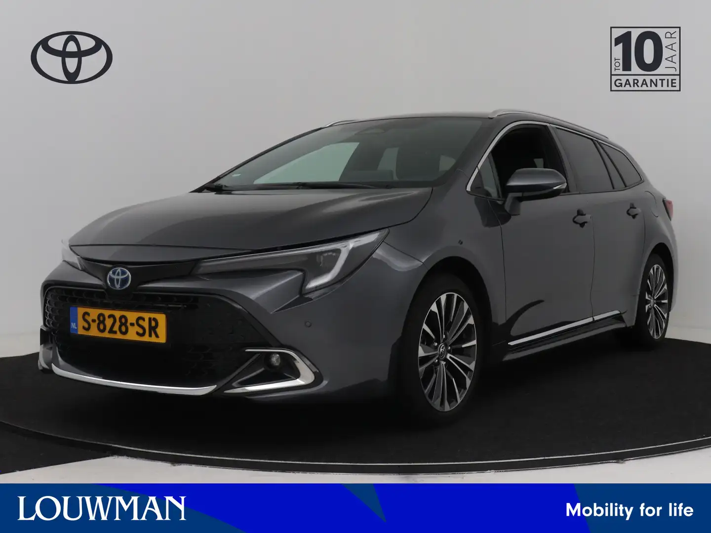 Toyota Corolla Touring Sports 1.8 Hybrid First Edition Grijs - 1