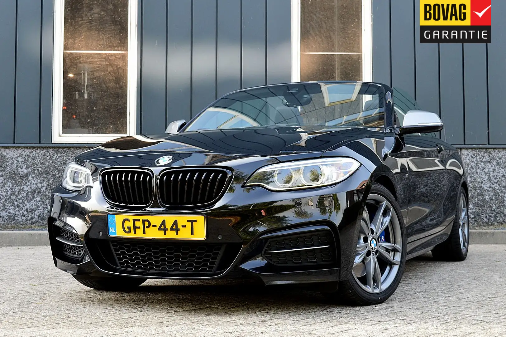 BMW 240 2-serie Cabrio M240i xDrive High Executive Rijklaa Zwart - 1